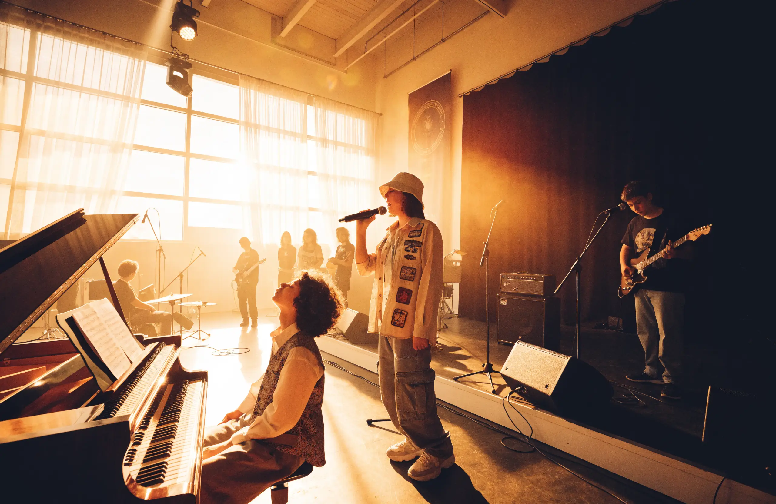 Young musicians rehearsing together on stage