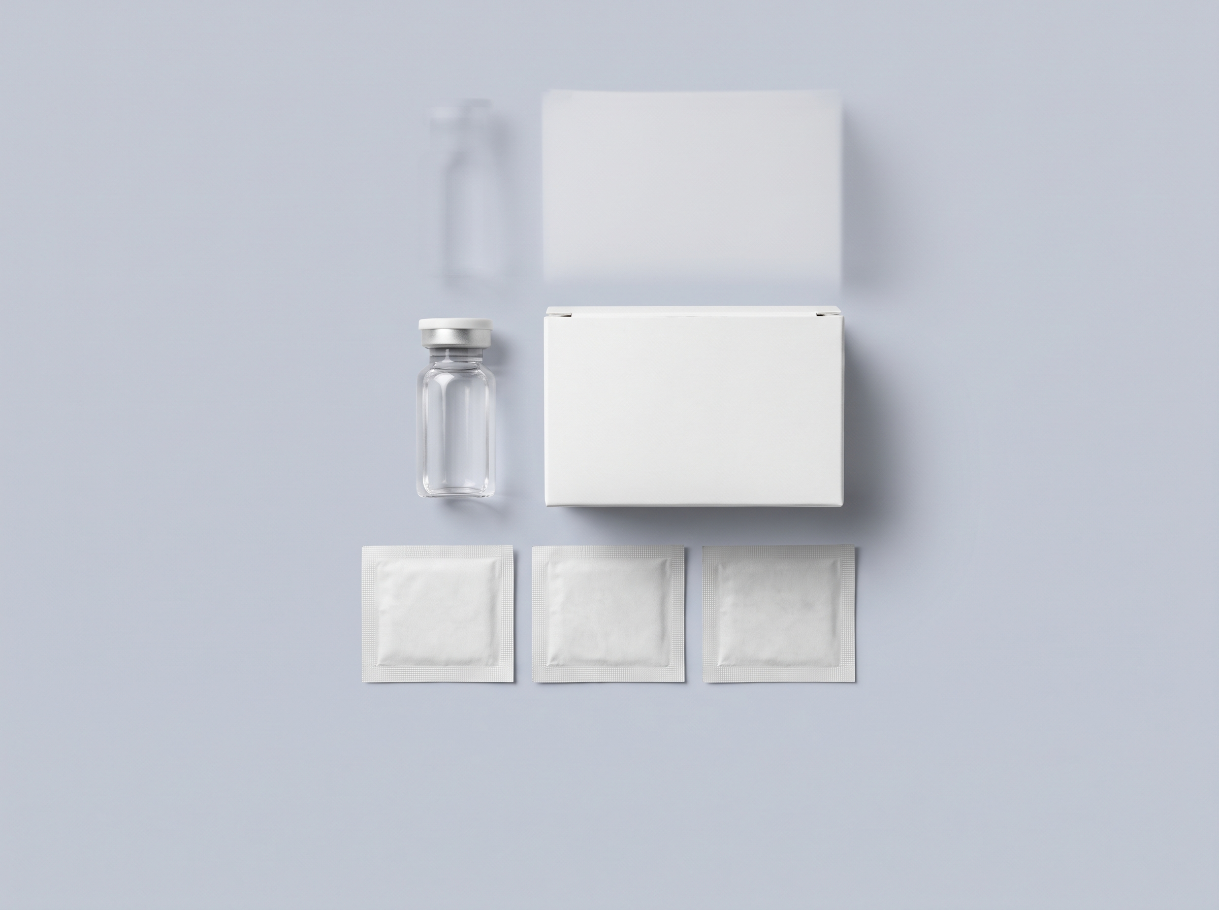 A glass vial, a carton and foil swab sachets