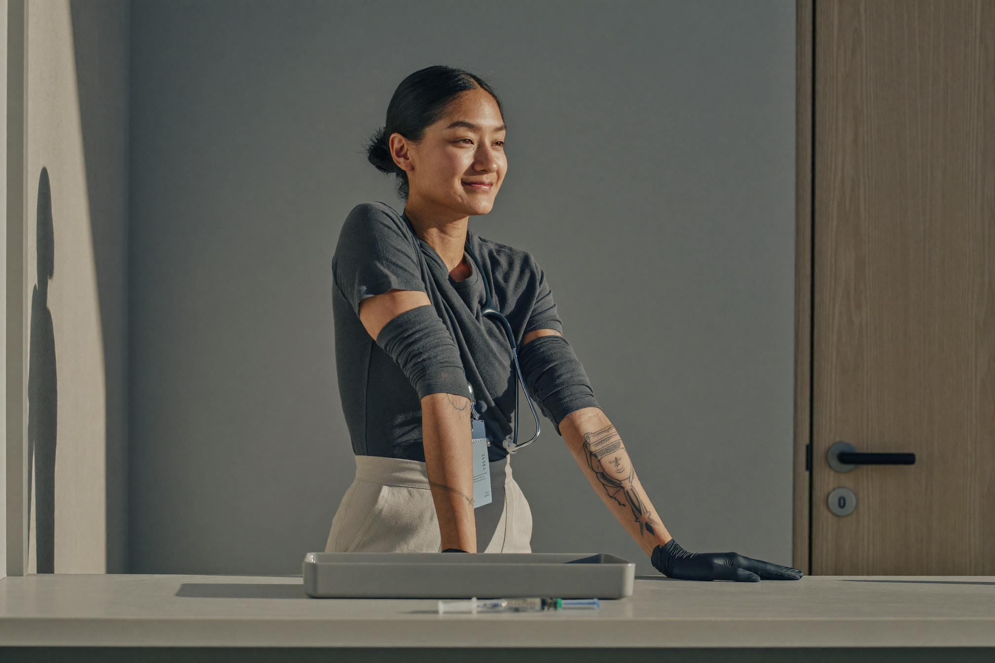 A practice manager at a clinic reception counter