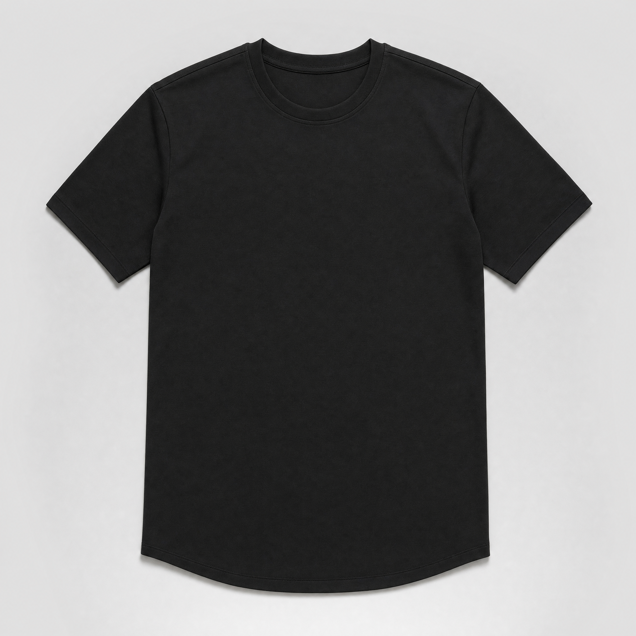 The Manifesto — krój dopasowany, subtle drop-cut hem