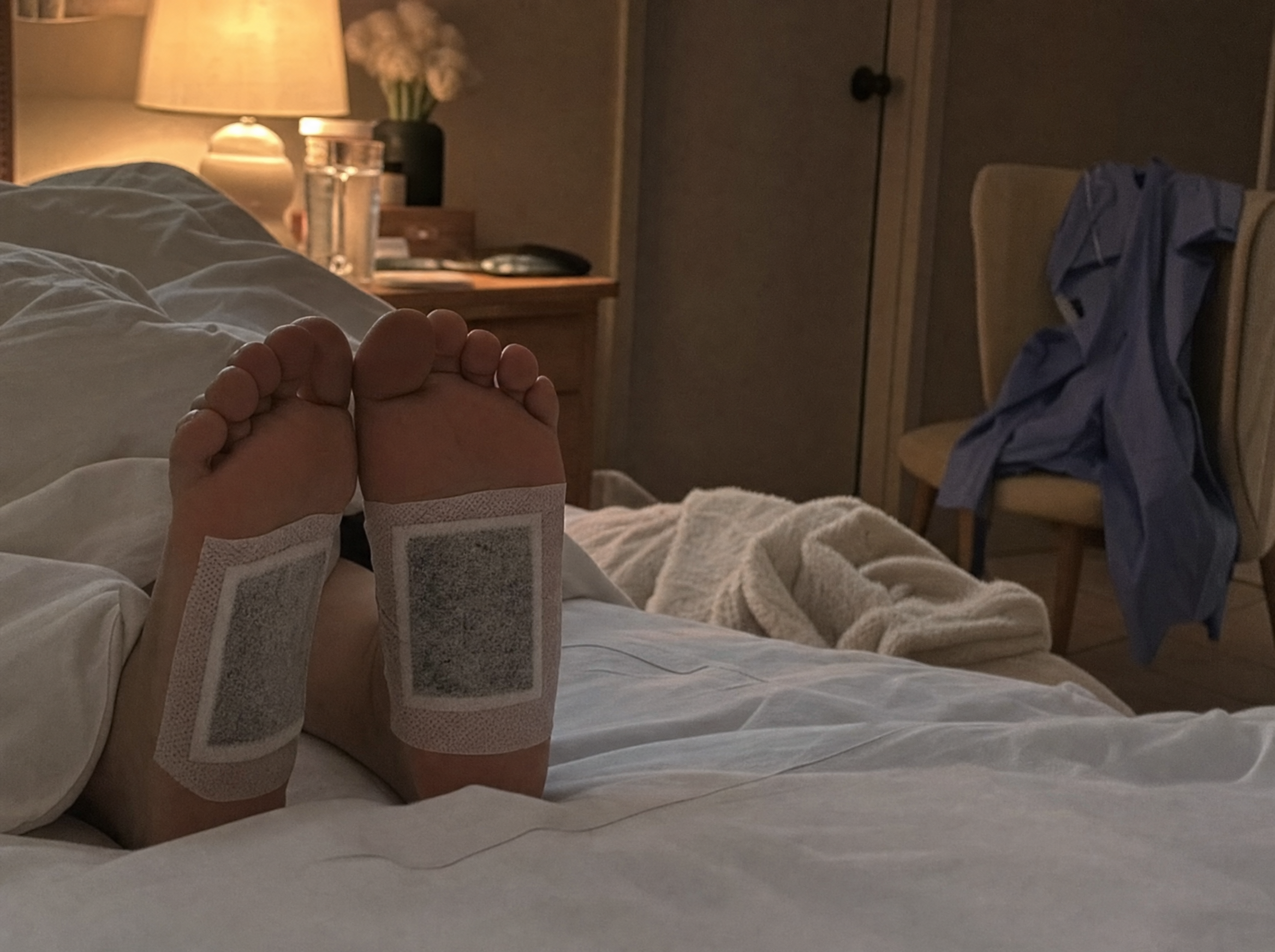 Nuzzelle foot patches laid out on bed