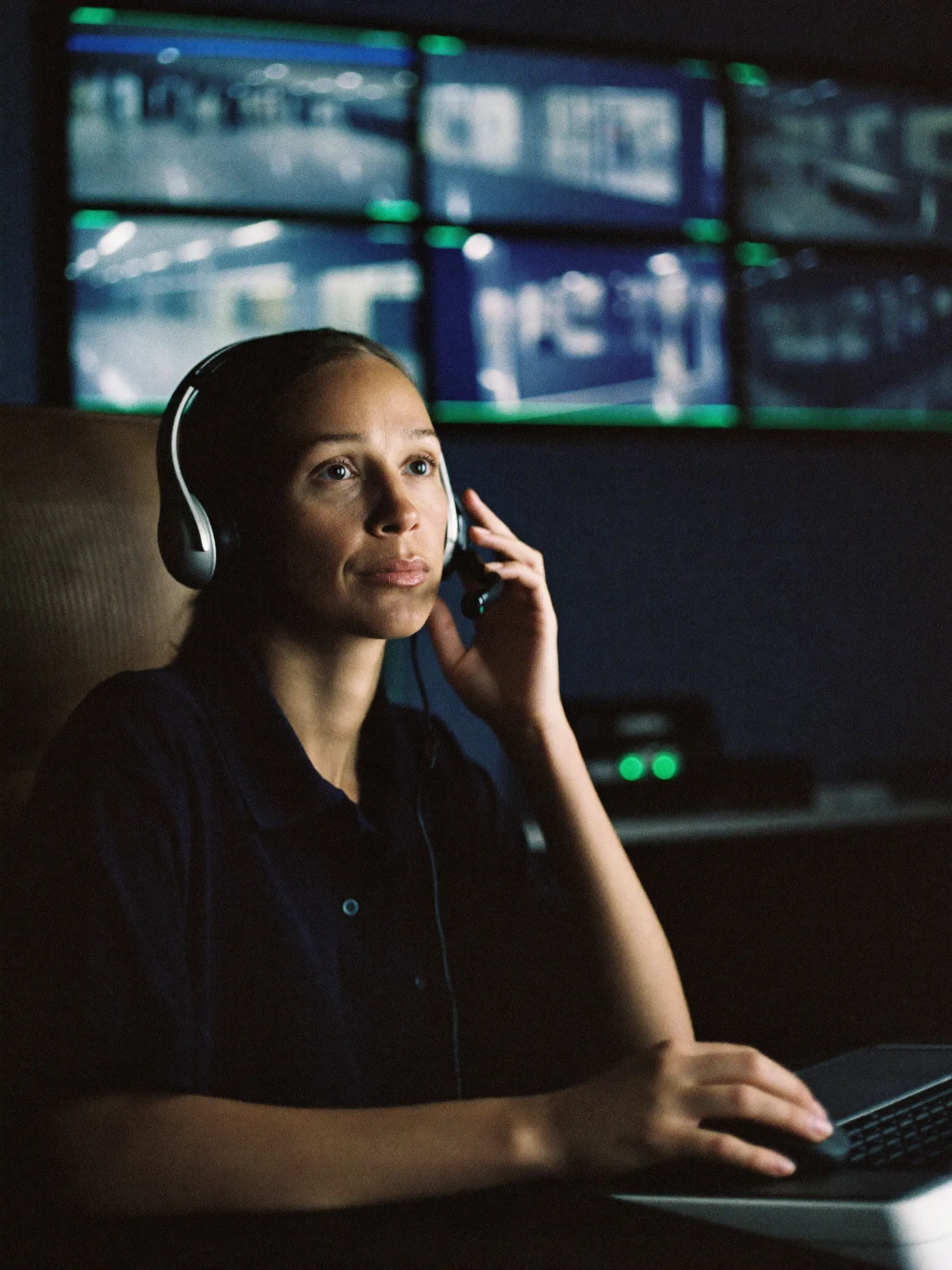 A CameraGuard operator watching live camera feeds at her workstation
