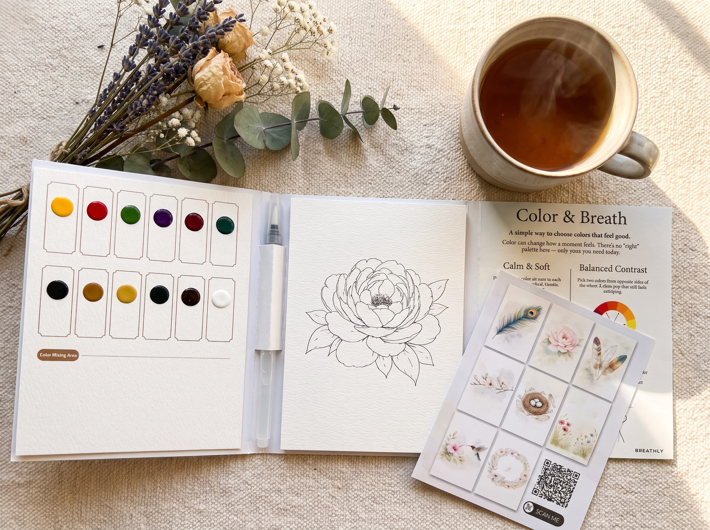an open guided watercolor workbook for adults with pre-printed pages, paints and a water-brush