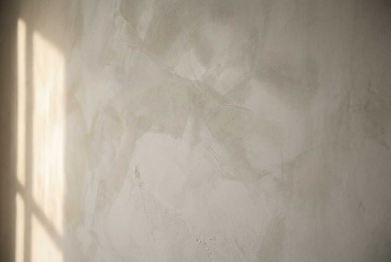 French wash wall finish showing soft cloudy glaze texture in an Auckland home