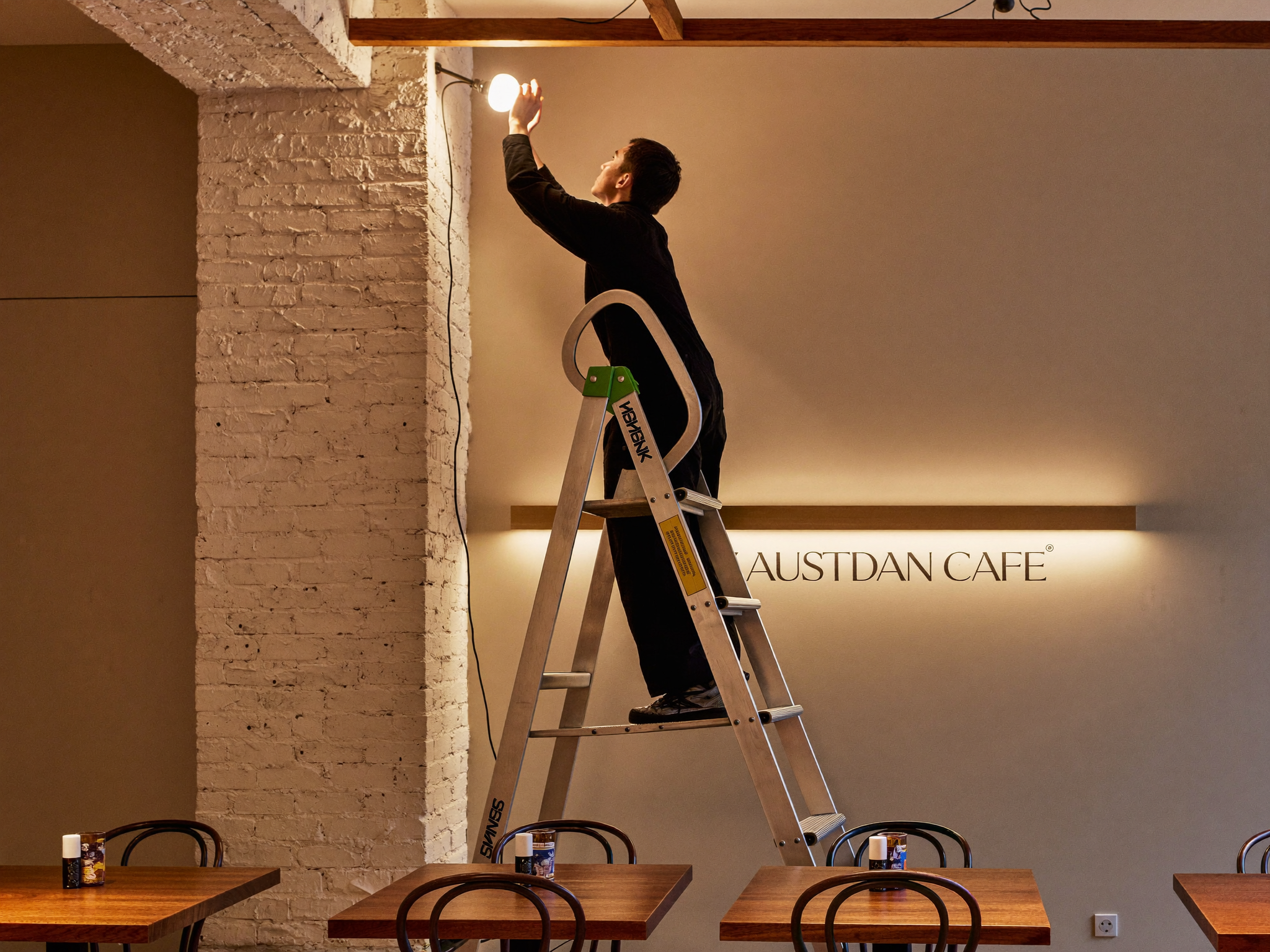 Commercial electrician installing cafe lighting in Adelaide