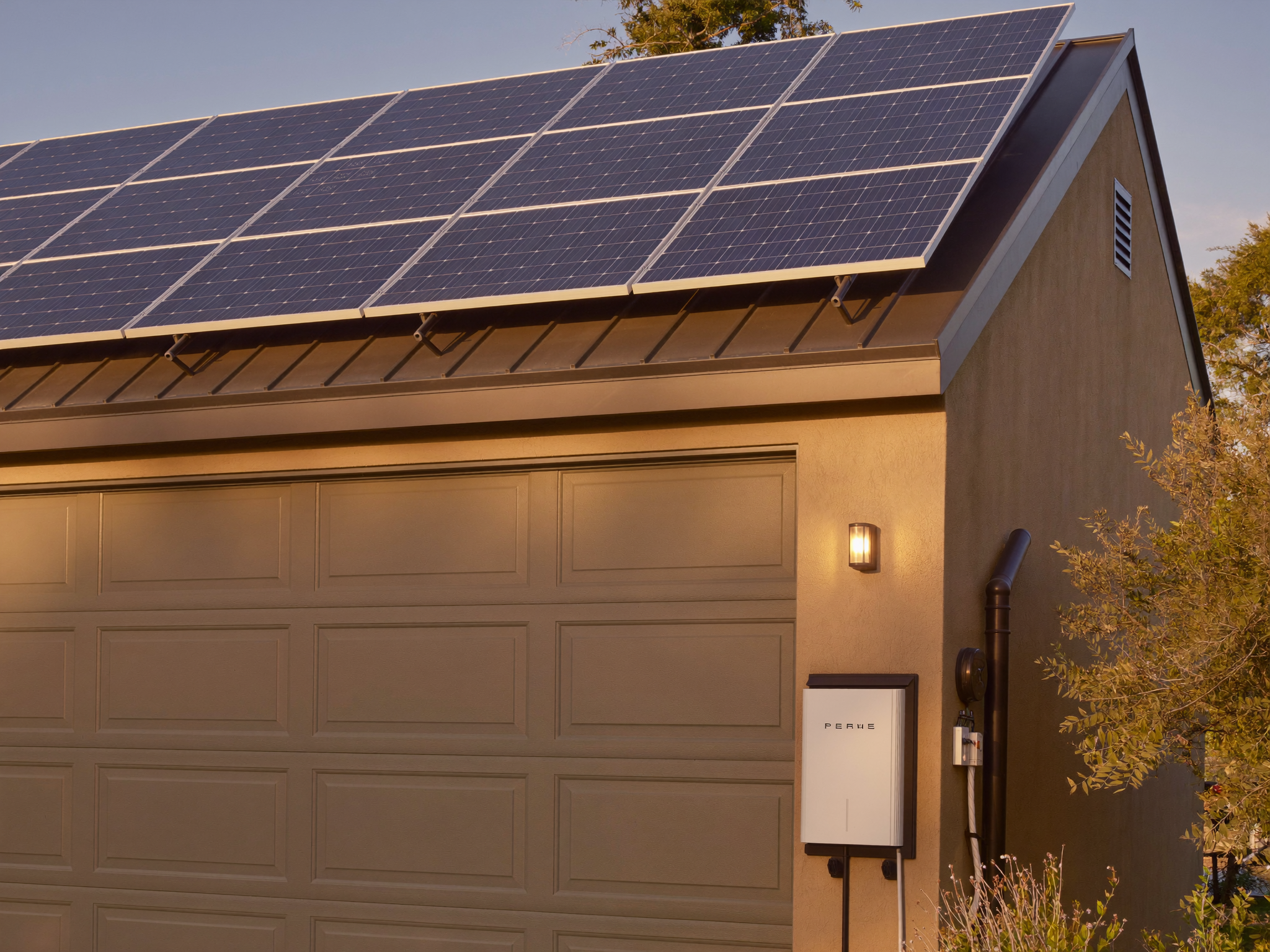 Adelaide home with solar panels and a home battery beside the switchboard