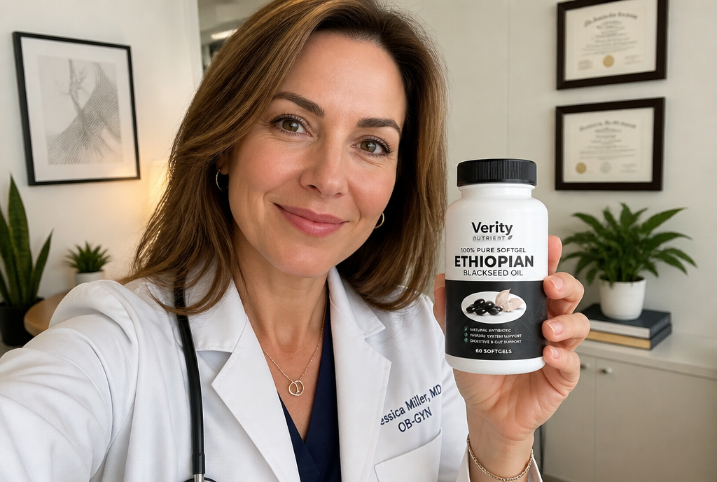 Dr. Kim holding Verity Nutrient bottle