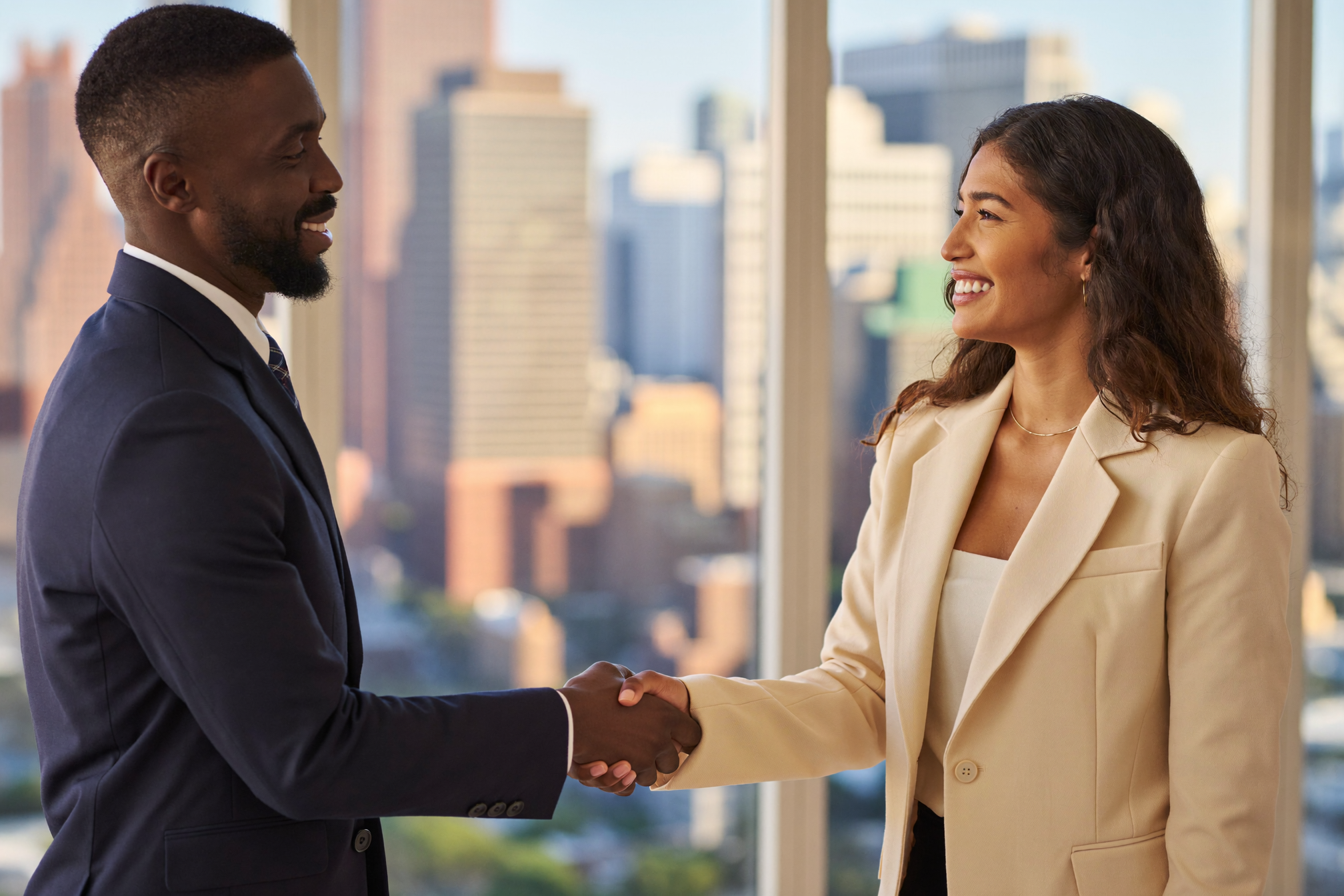 Two business partners shaking hands