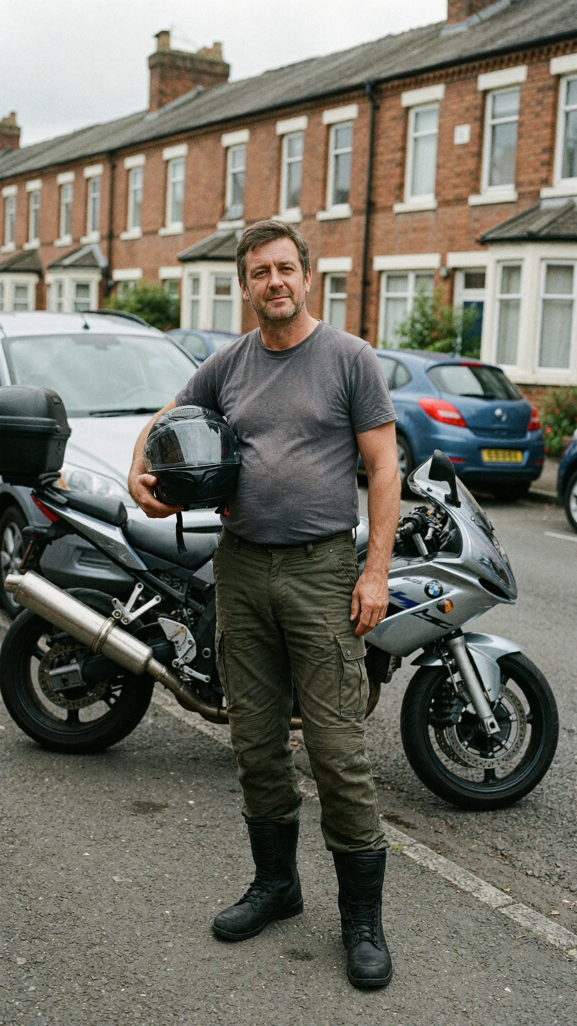 Rider with helmet on a British street