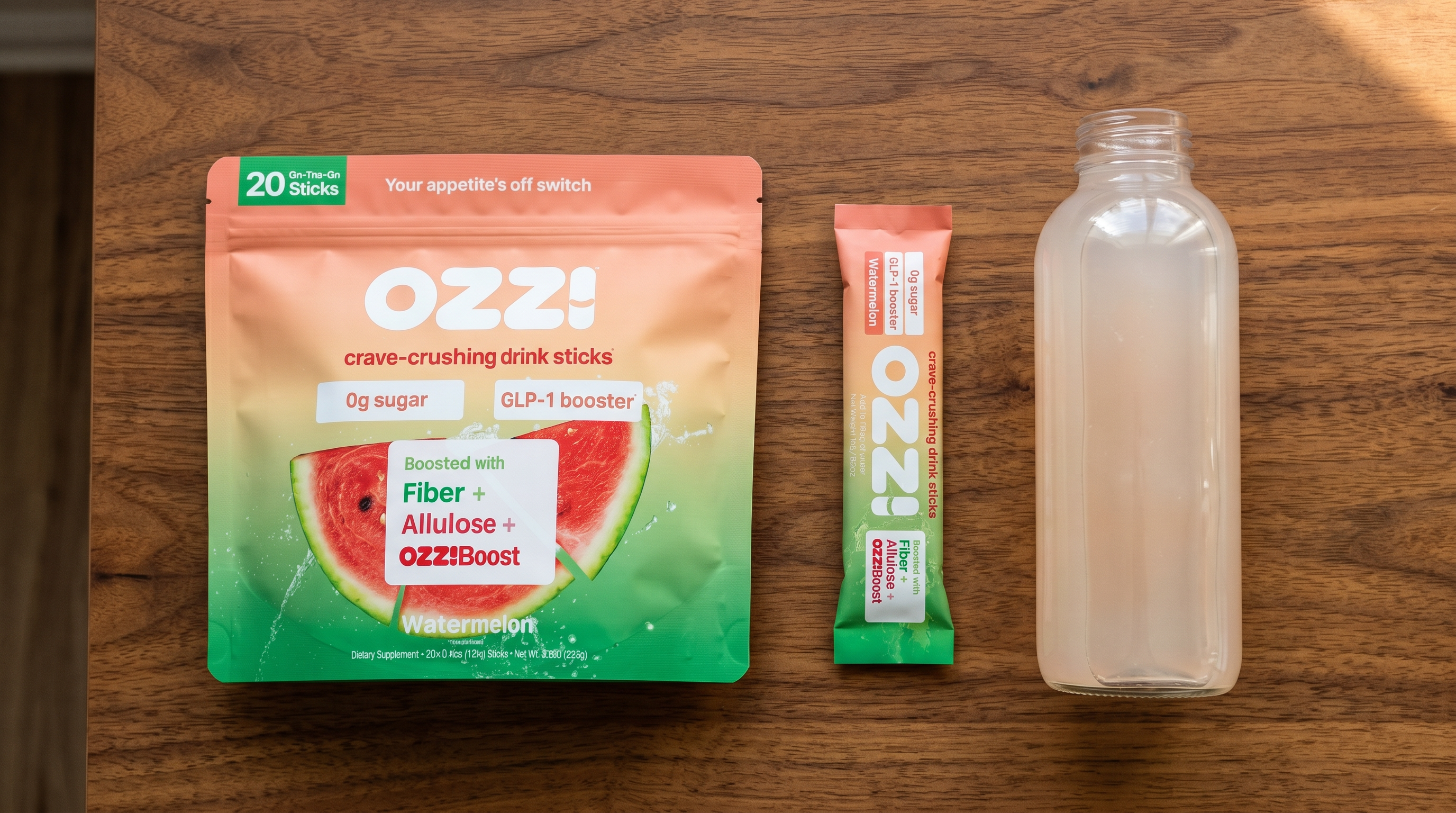 Single Ozzi stick pack torn open beside a bottle of prepared drink