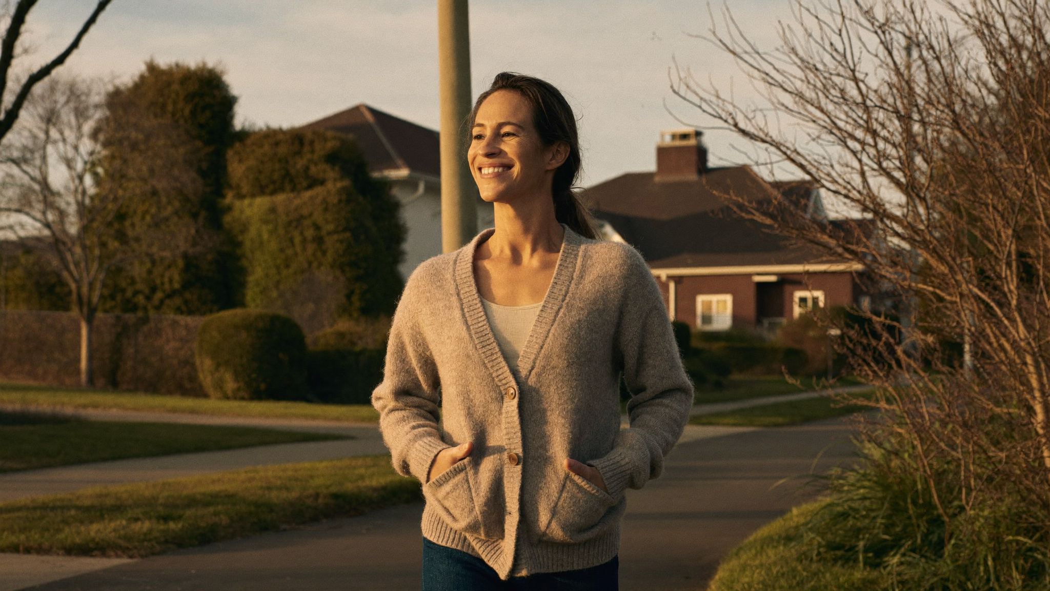 Woman on a calm evening walk at golden hour, an alternative reward to reaching for a snack