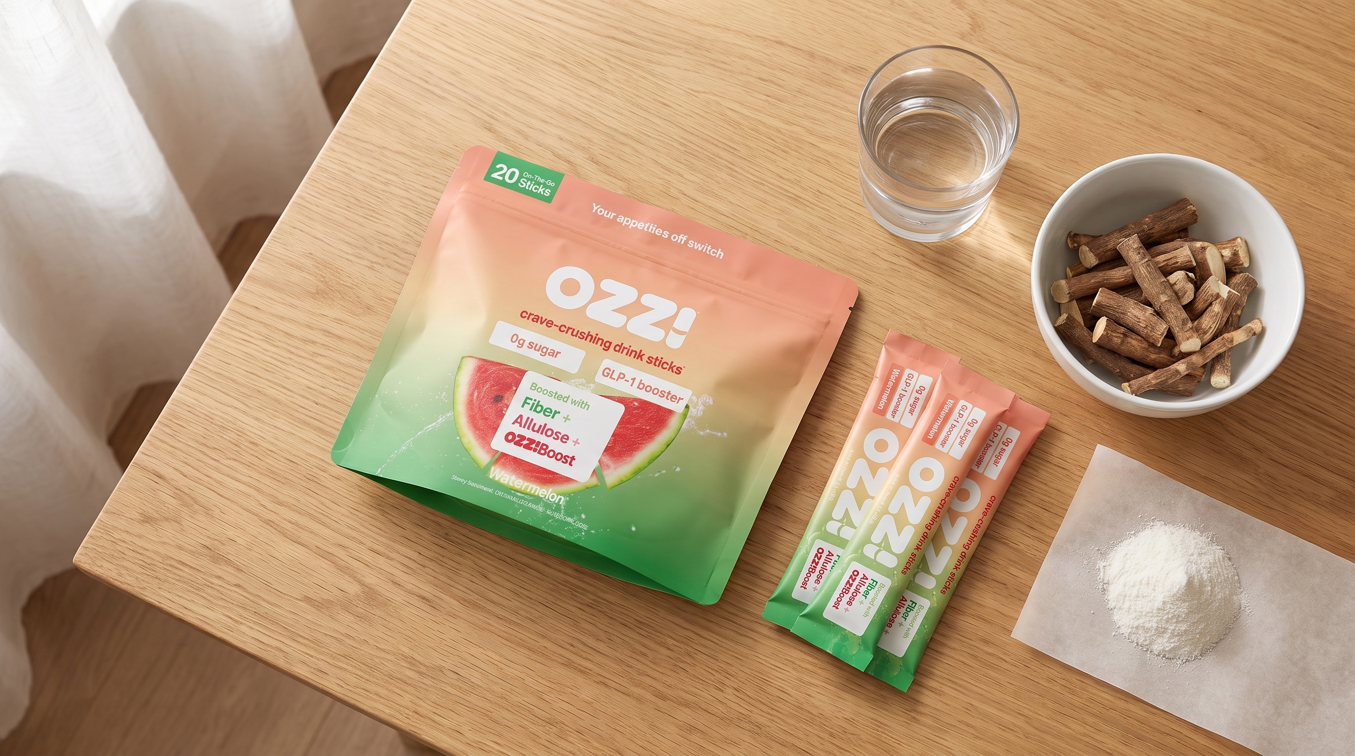 Ozzi watermelon stick pack pouch and sticks in an overhead flat lay with chicory root and konjac fiber powder