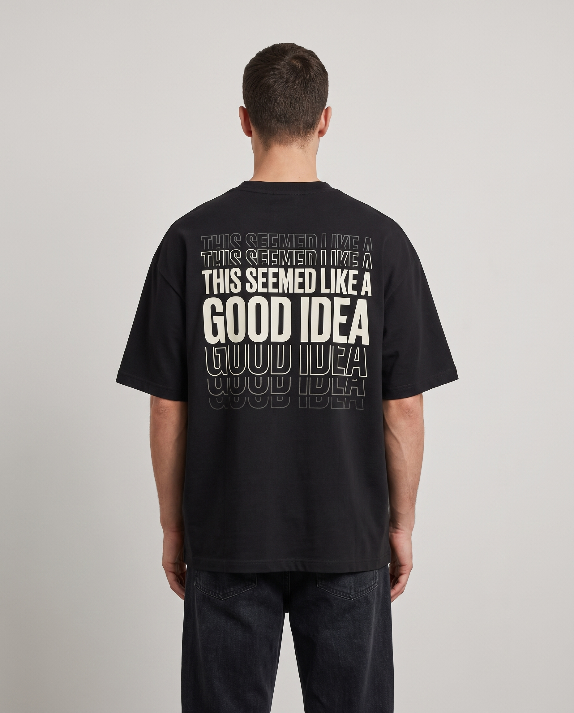 Black tee, back print reading THIS SEEMED LIKE A GOOD IDEA