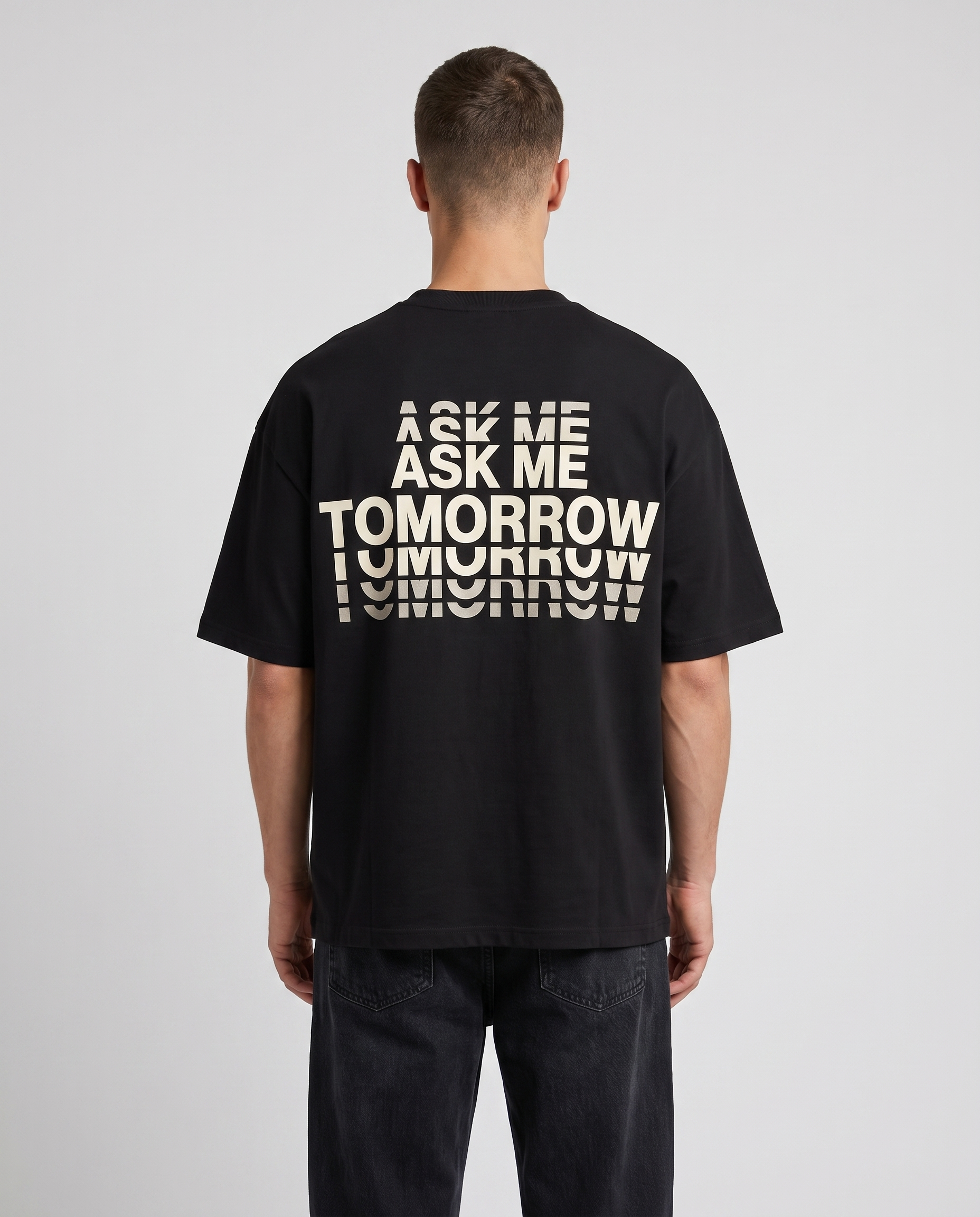 Black tee, back print reading ASK ME TOMORROW