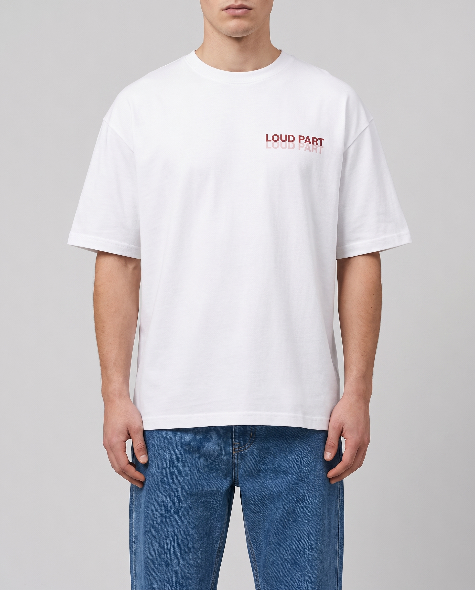 Front of the white tee with the small chest hit