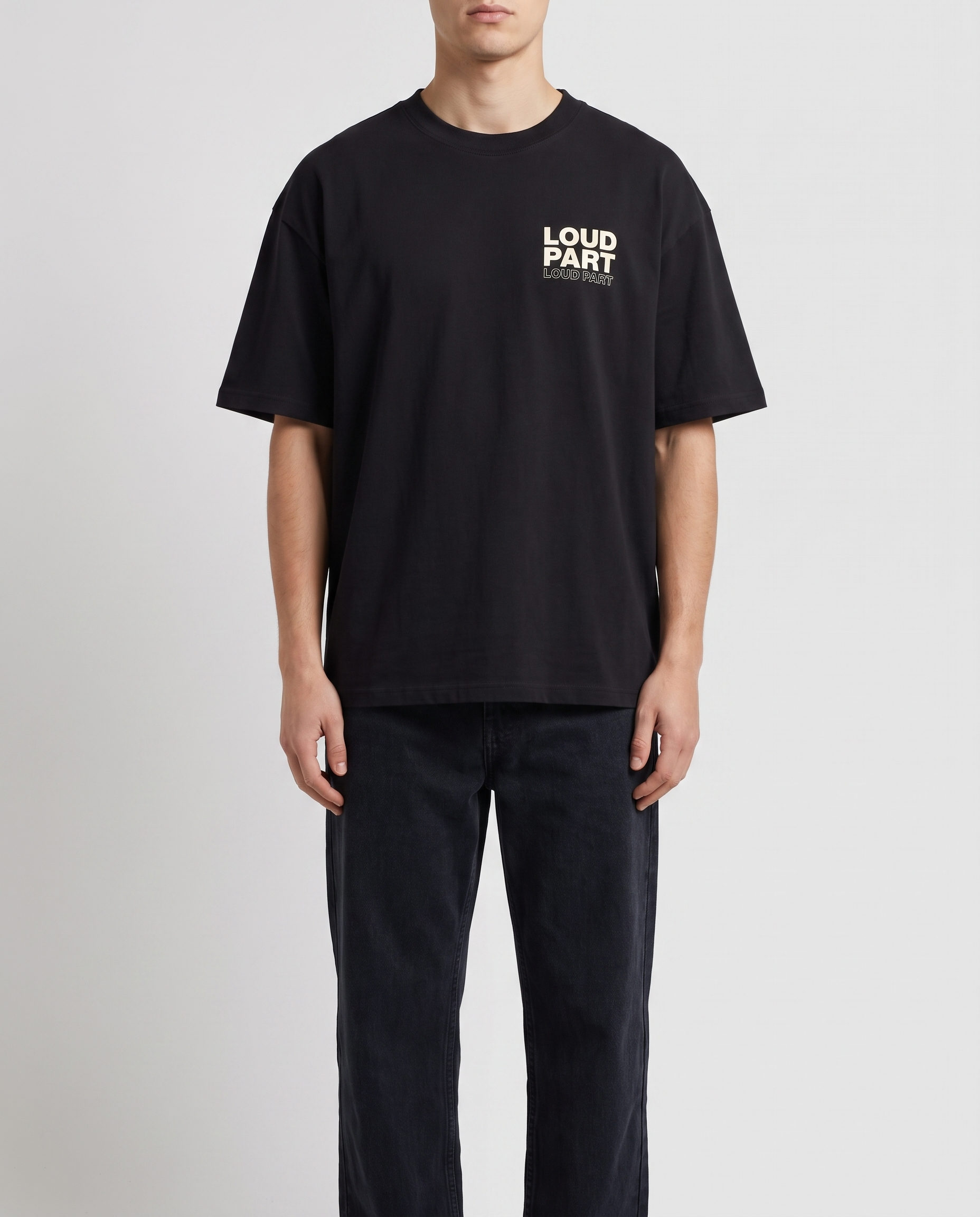 Front of the black tee with the small chest hit
