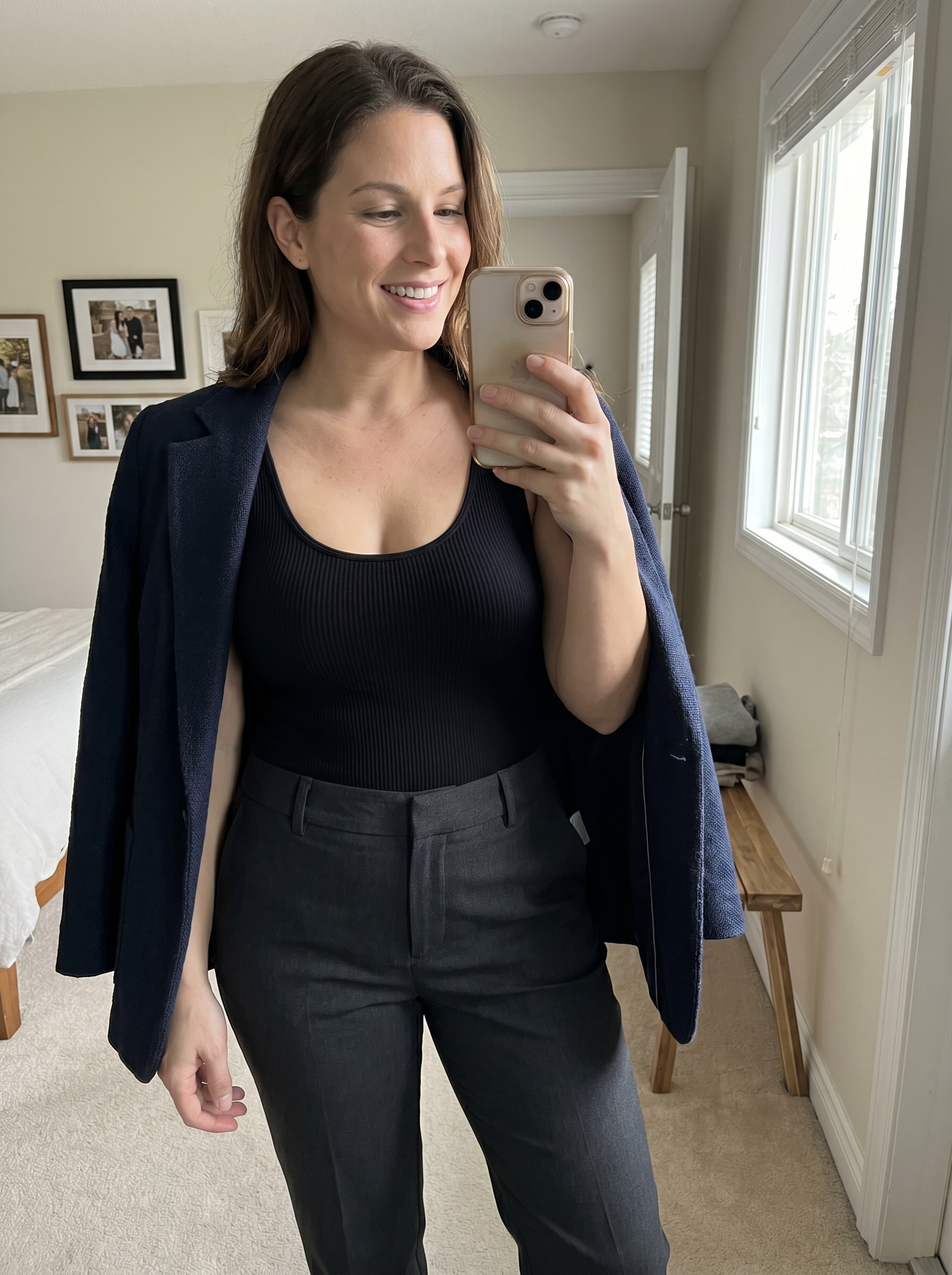 The Sculpt Ribbed Bodysuit worn under a blazer for work
