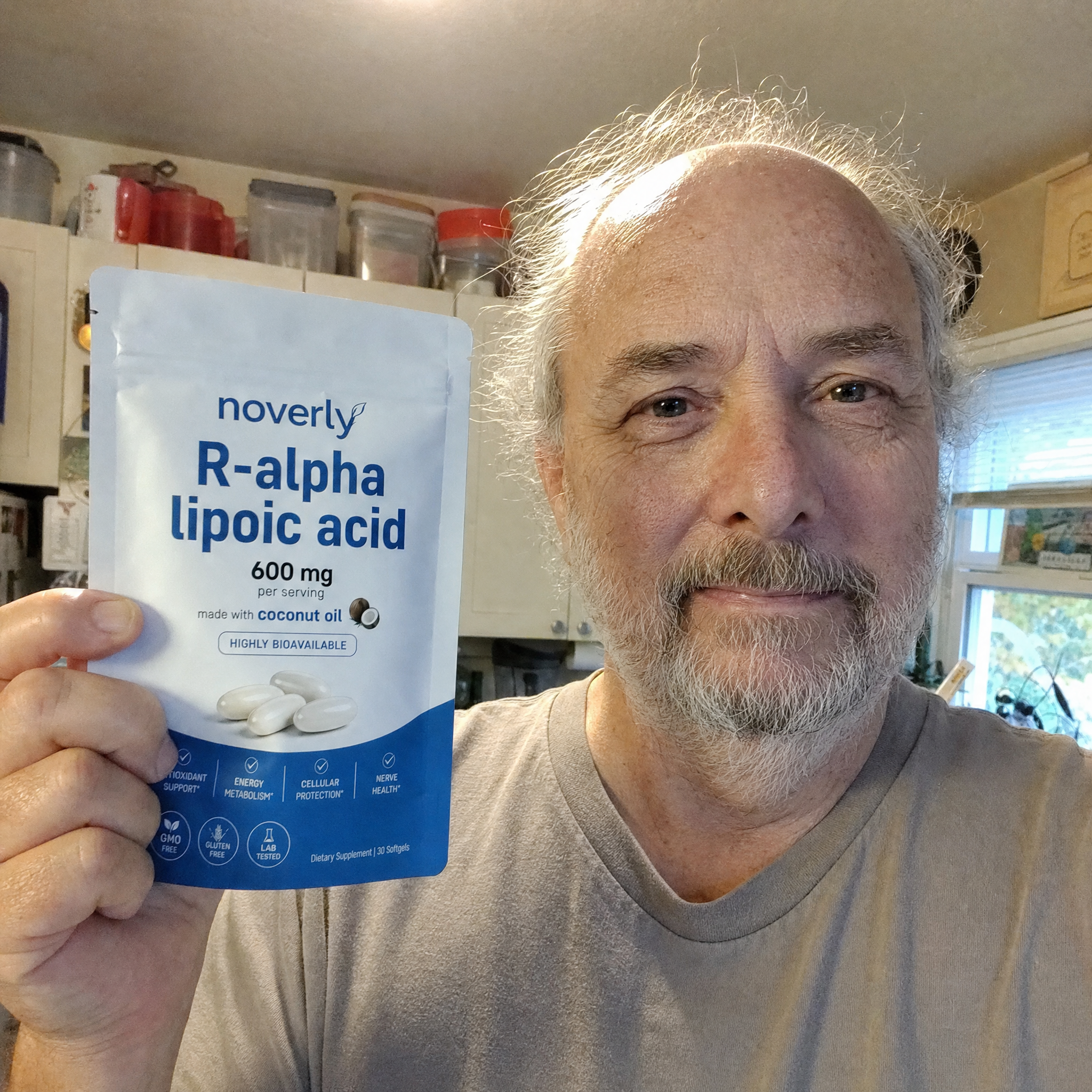 Ray Ostrander holding Noverly R-Alpha Lipoic Acid