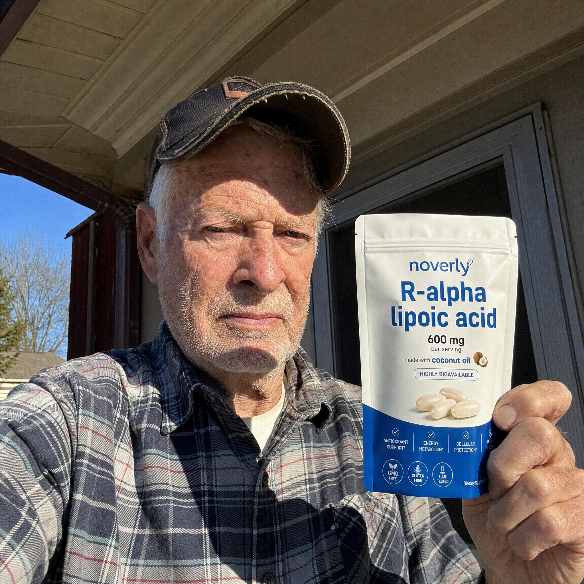 Curtis Yarnell holding Noverly R-Alpha Lipoic Acid