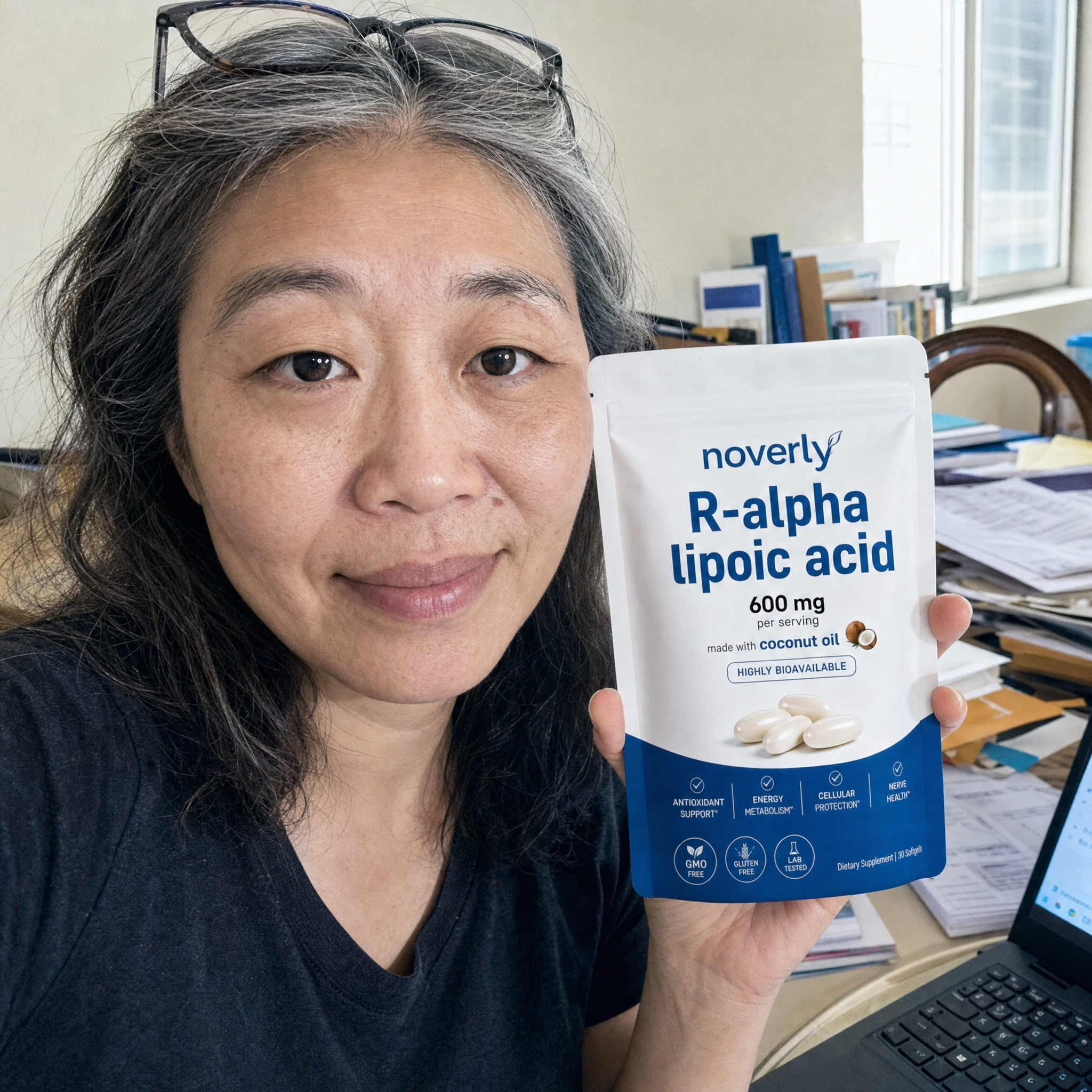 Anita Sung holding Noverly R-Alpha Lipoic Acid