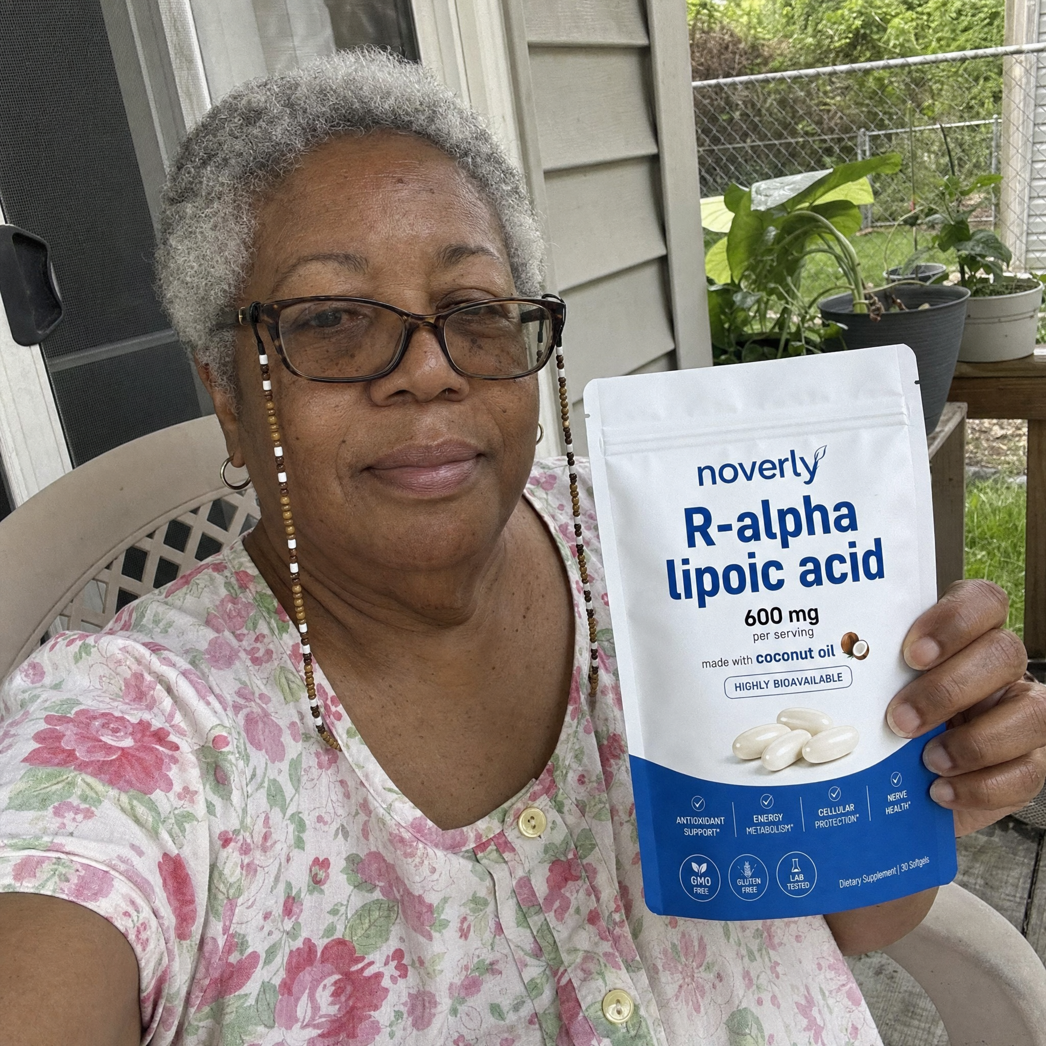 Gloria B. holding Noverly R-Alpha Lipoic Acid