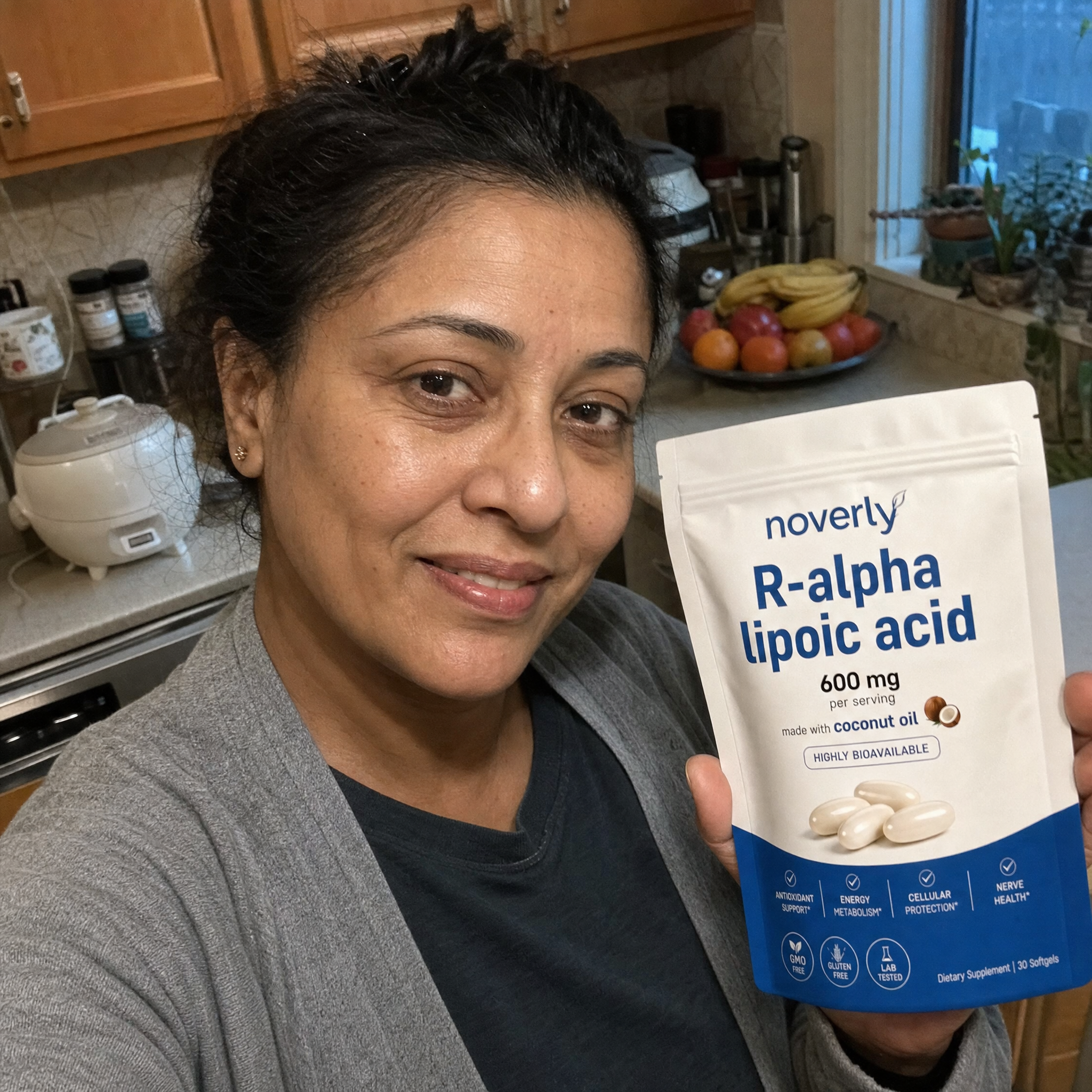 Priya N. holding Noverly R-Alpha Lipoic Acid