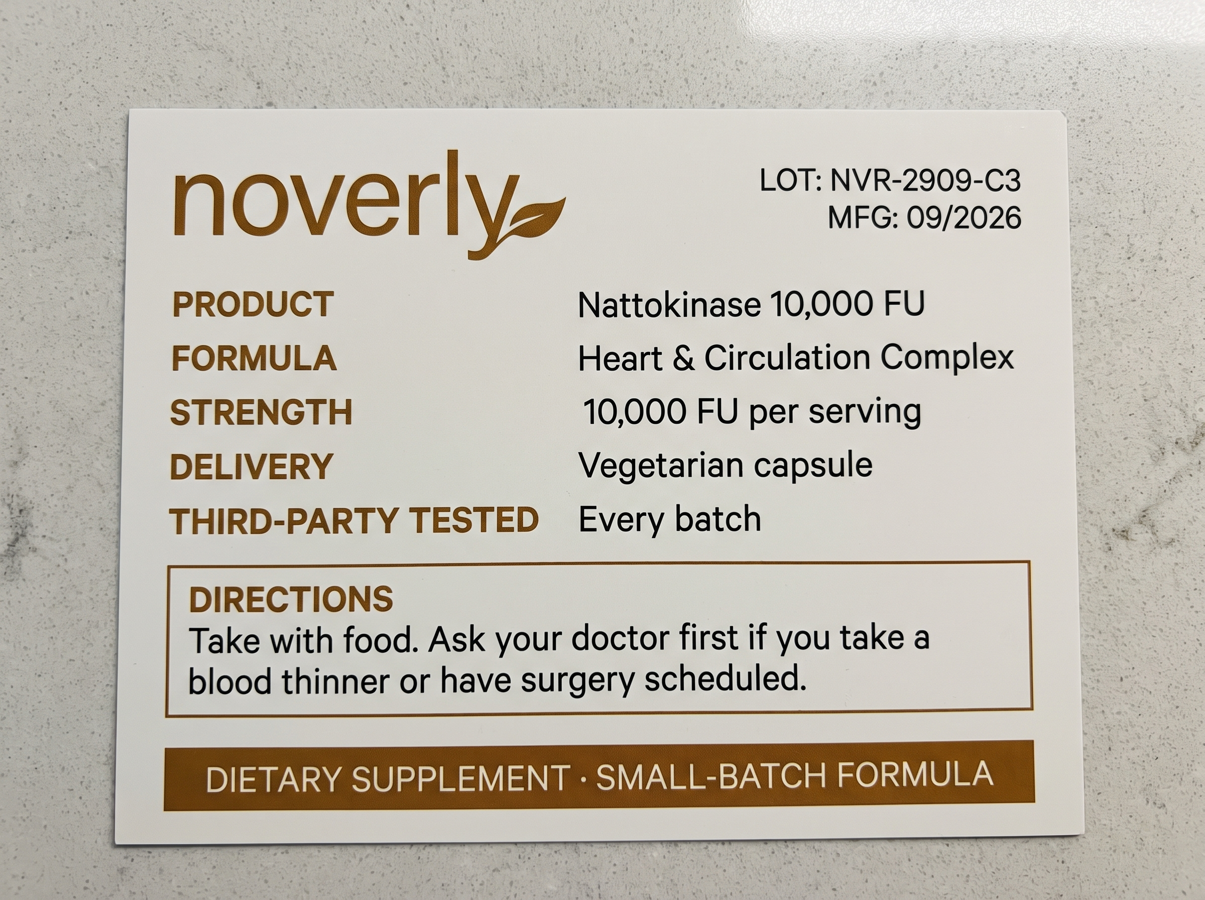 Noverly Nattokinase spec label — LOT NVR-2909-C3, MFG 09/2026, 10,000 FU per serving, small-batch