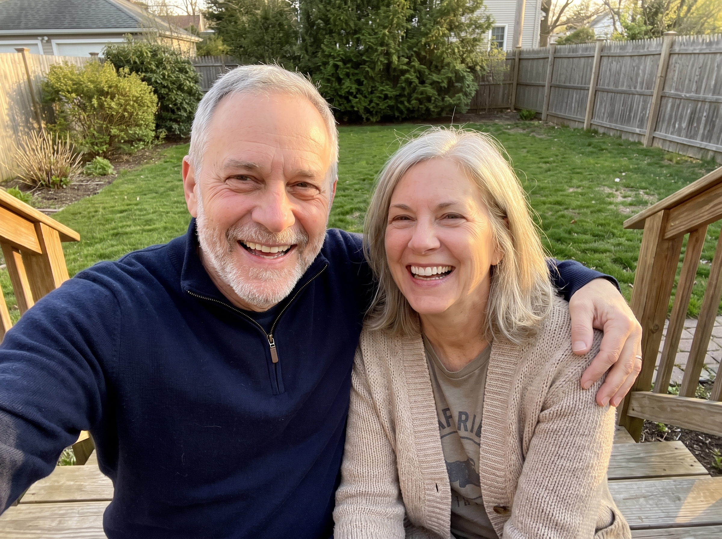 Glen and his wife laughing together on the back porch in the evening