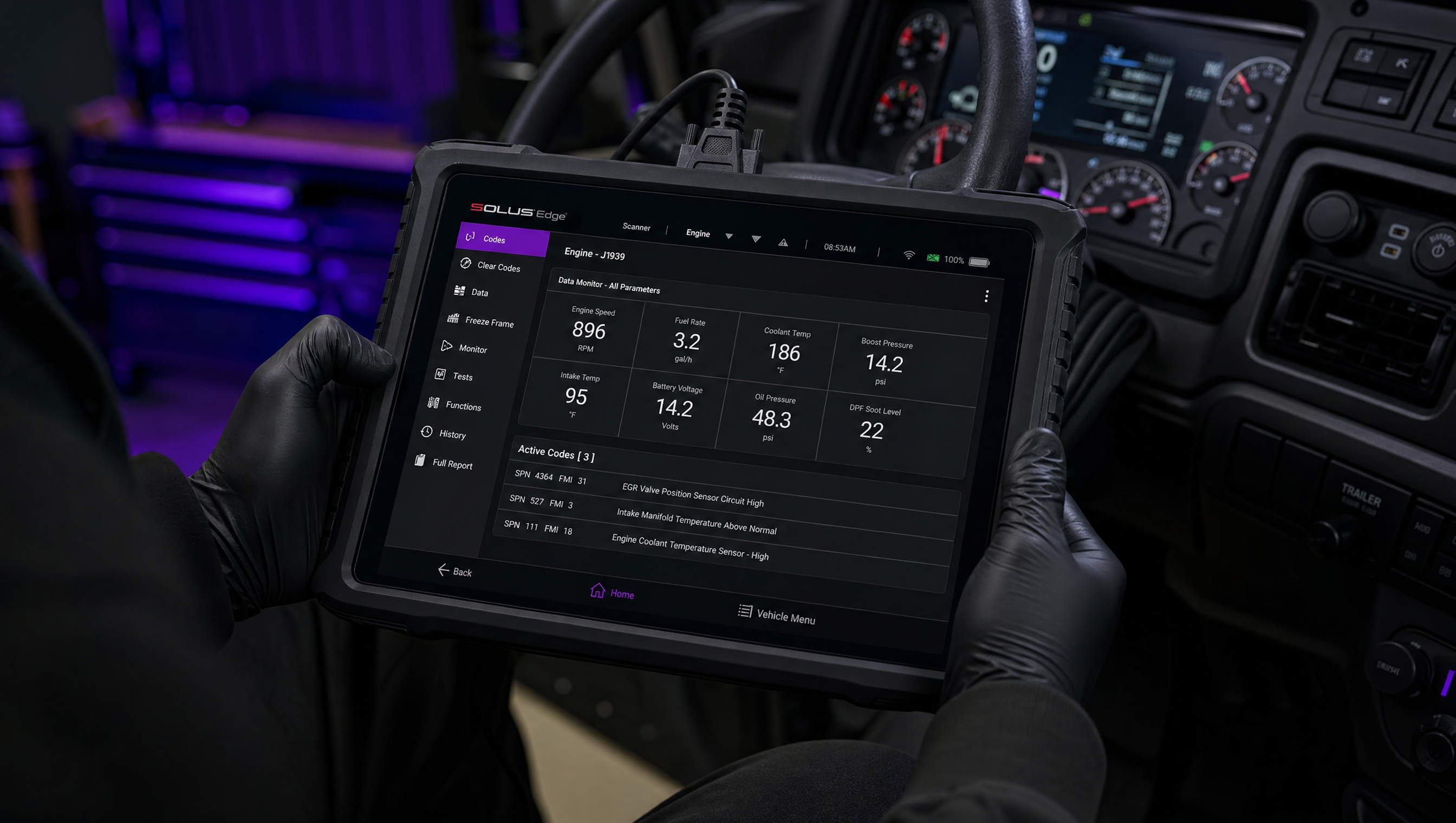 Diagnostic tablet showing engine parameters connected to diesel truck at Affliction Diesel