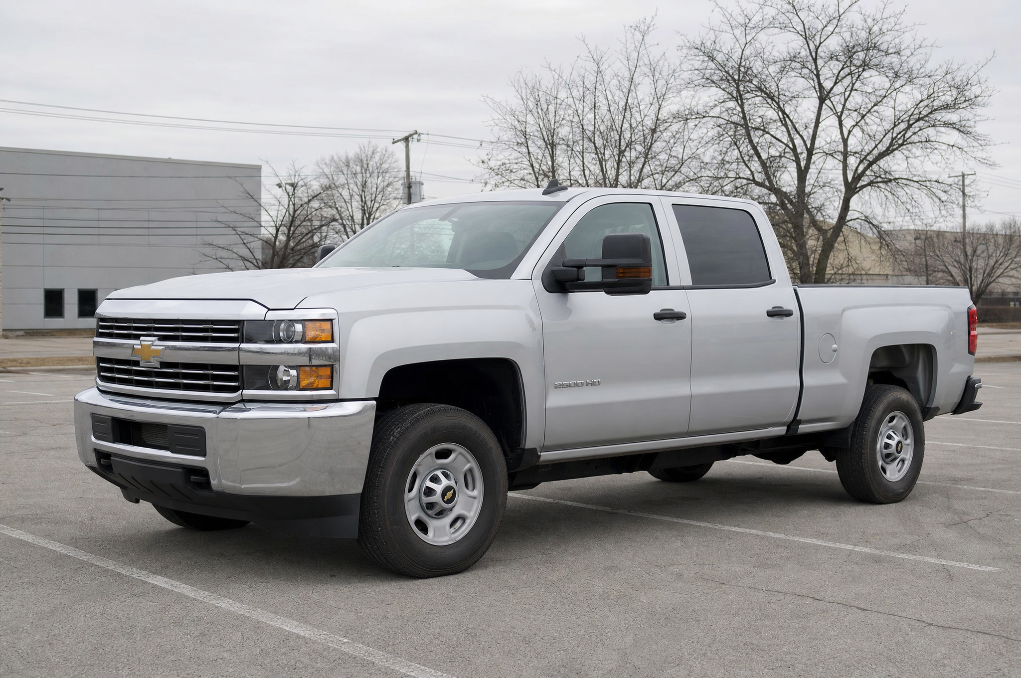 Stock silver Chevy Silverado 2500HD Duramax in a parking lot