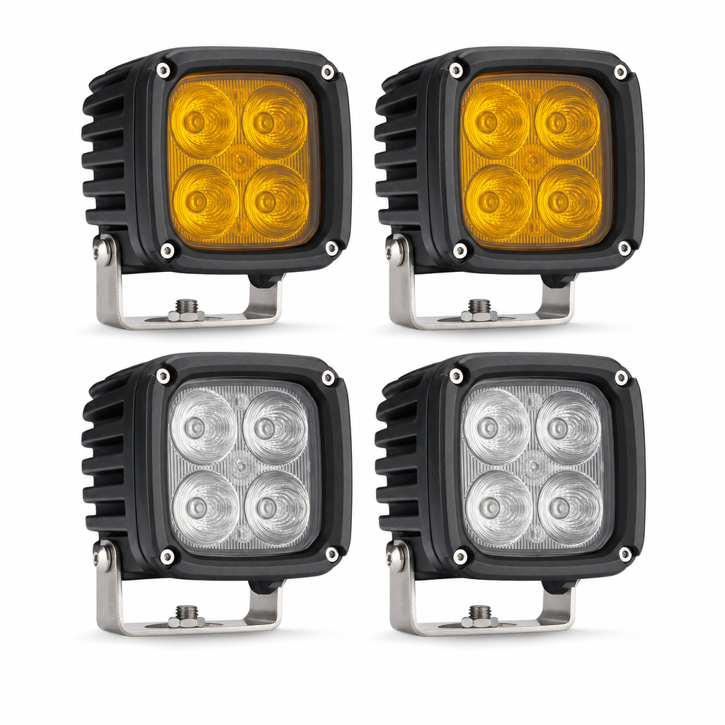 Square LED pod lights in amber and clear on white background