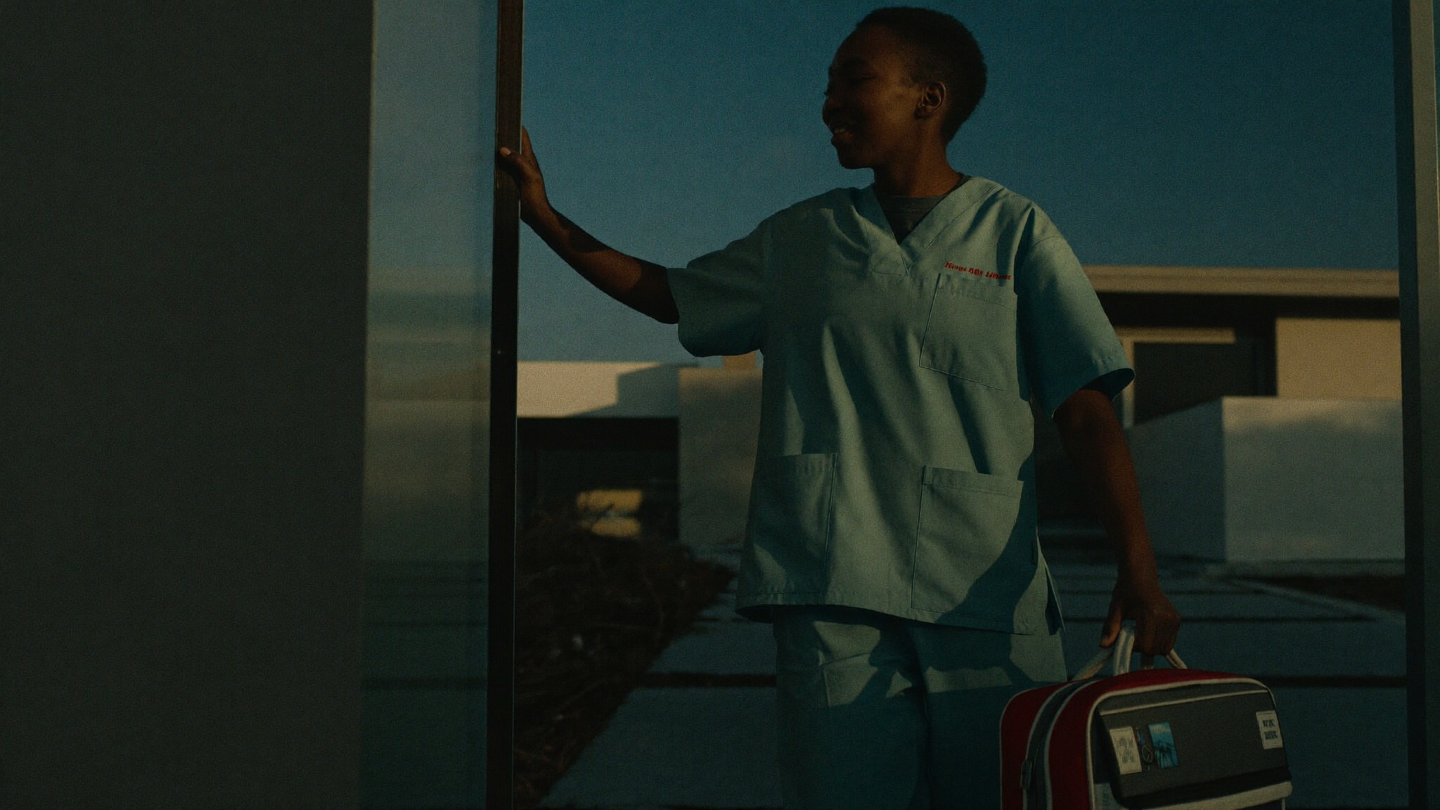Nurse arriving at a home in Lagos