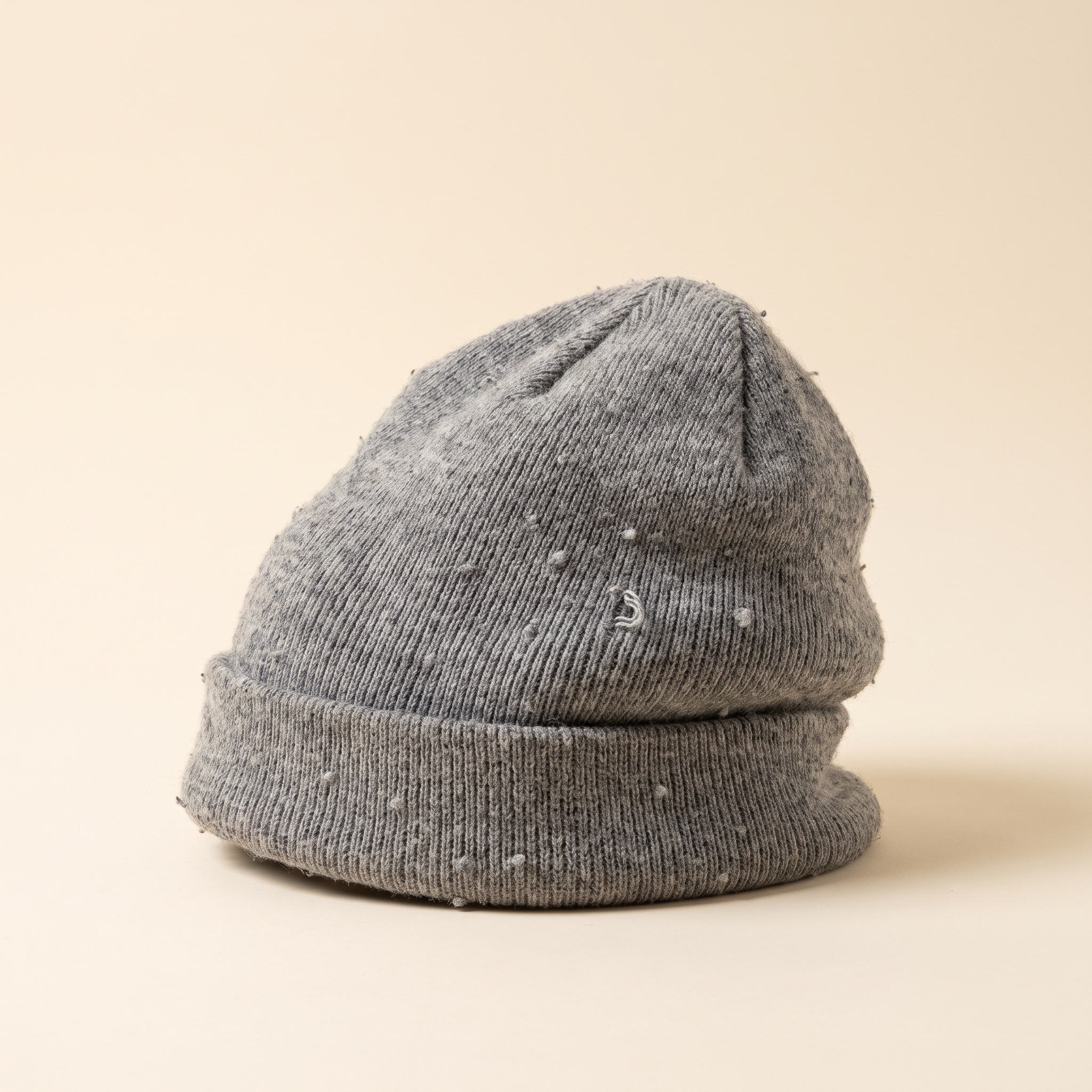 A shapeless grey wool beanie