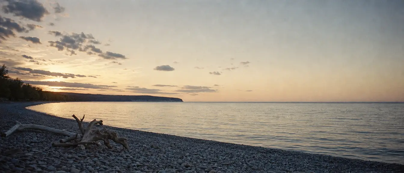 Lake Ontario horizon at dusk from a pebble beach, Upstate New York