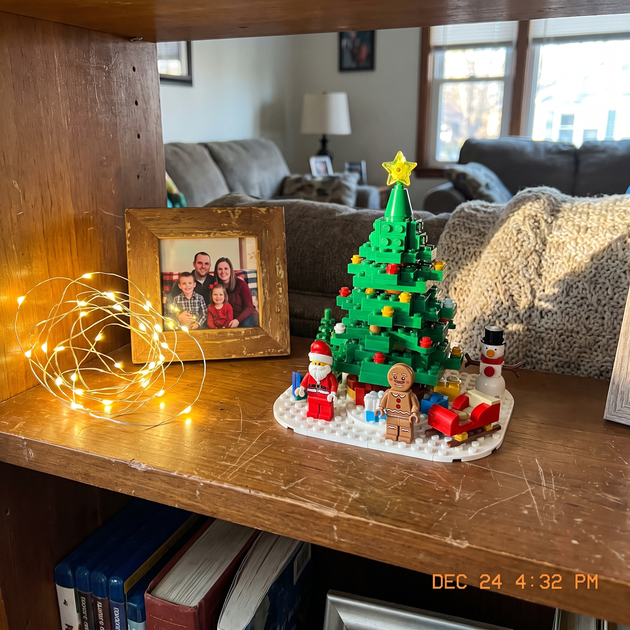 The finished village displayed on the shelf as Christmas decor