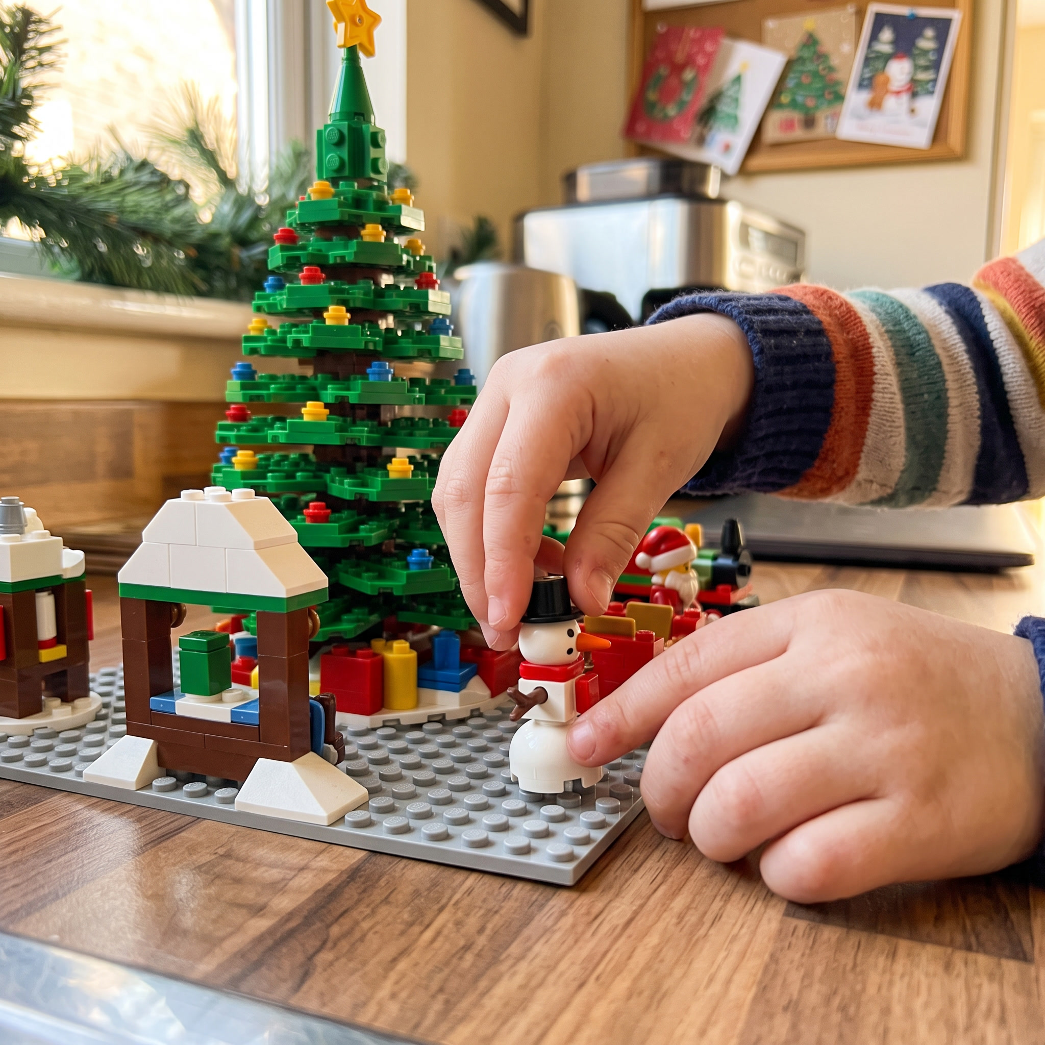 The click — the day's build snapping onto the village