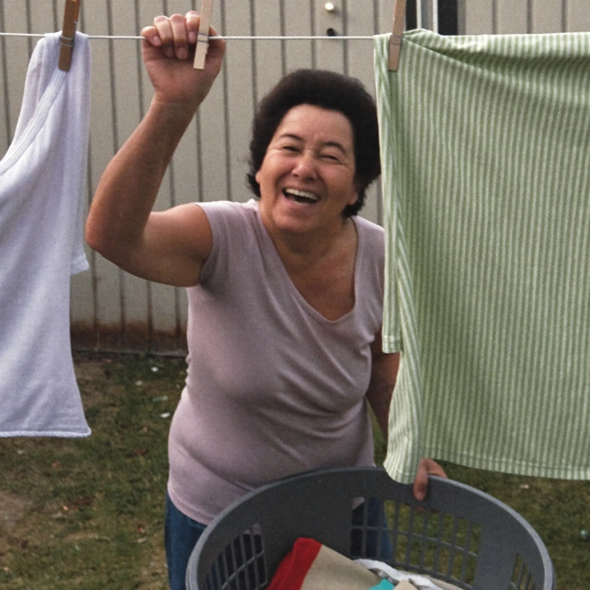 Lyn hanging out the washing