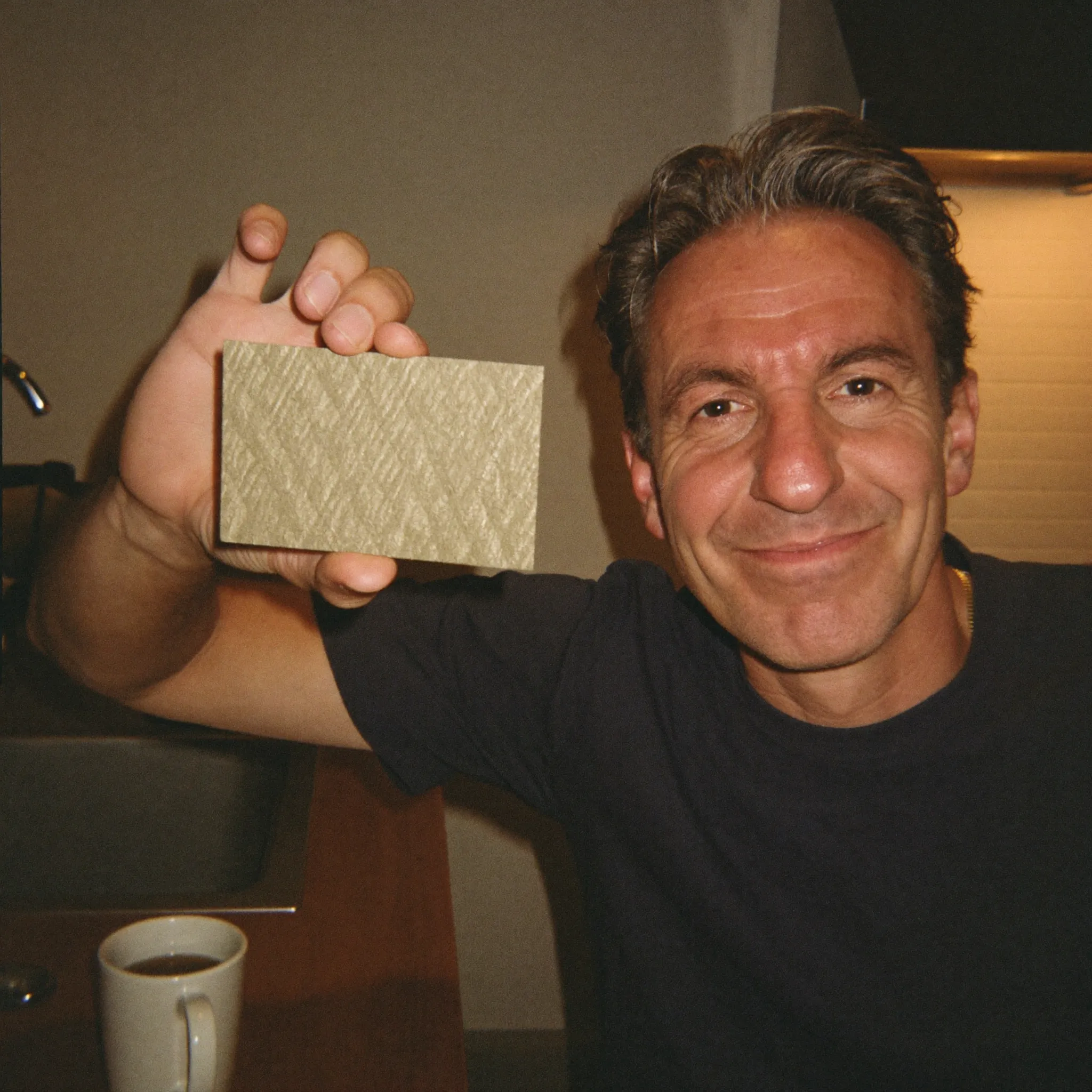 Graham holding the woven cotton patch