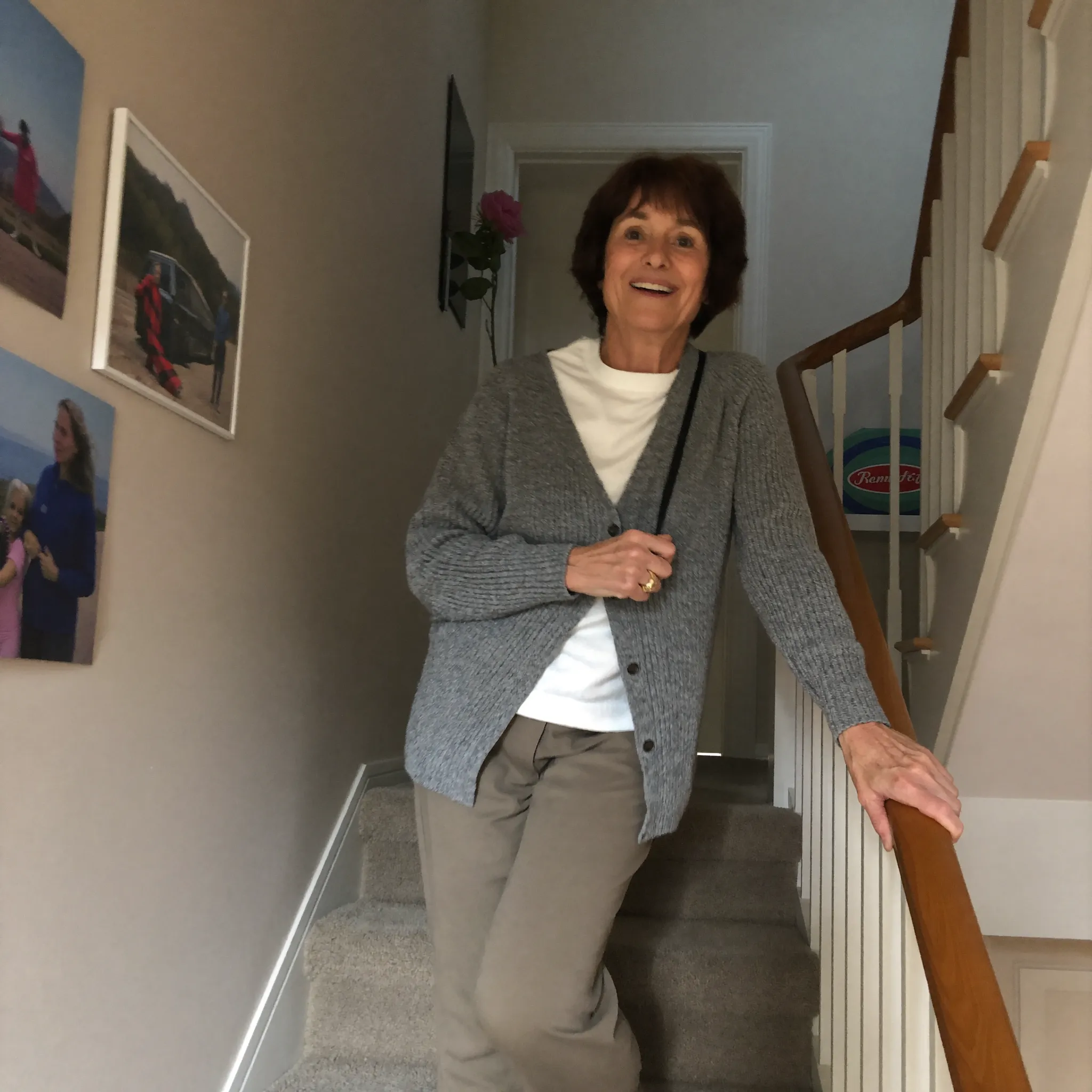 Diane coming down the stairs at home