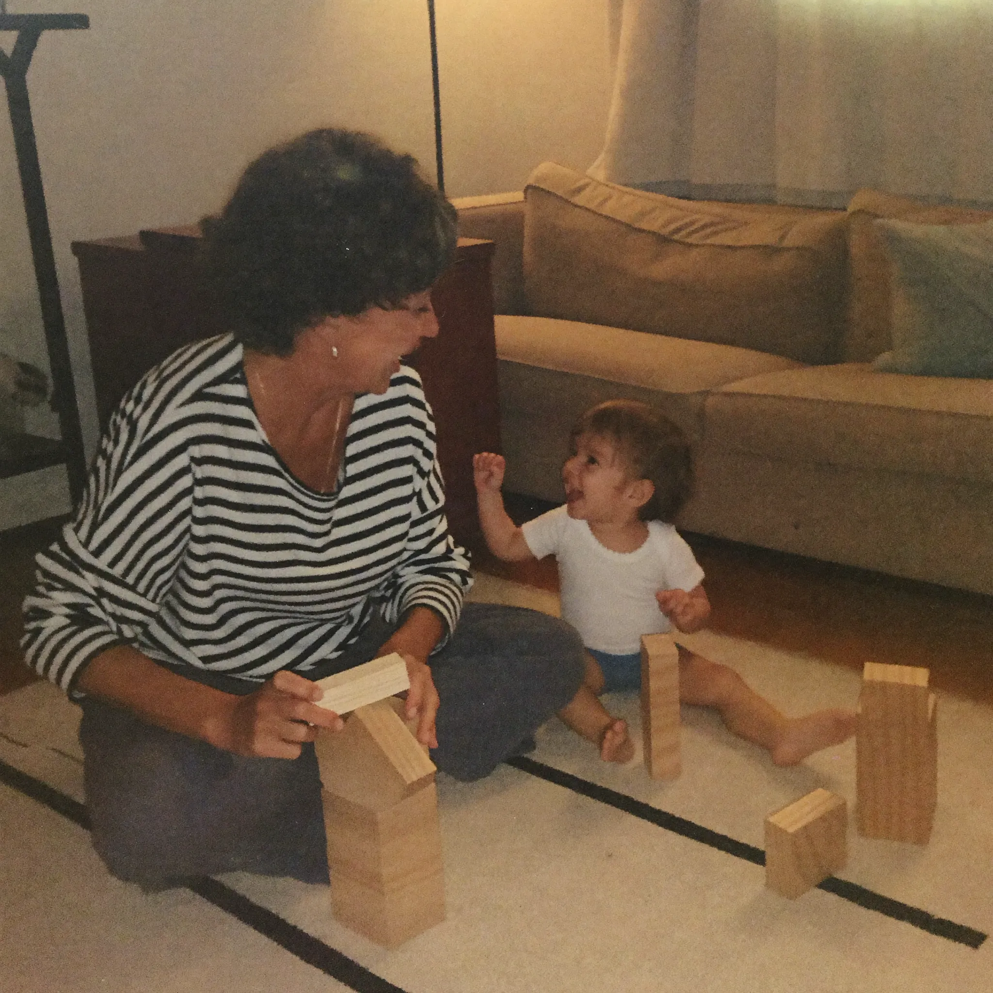 Rosa playing blocks with her grandson