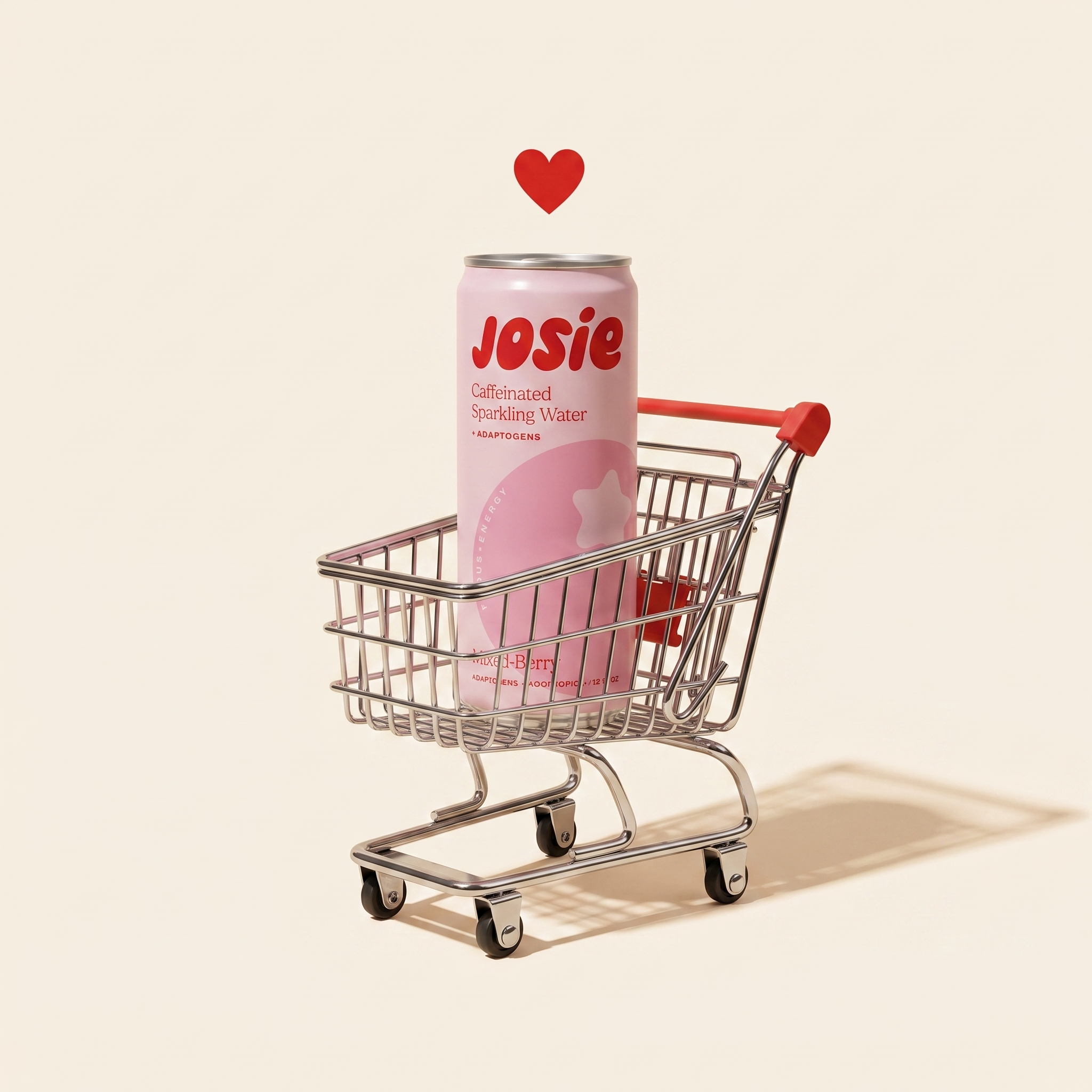 A single Josie can sitting alone in a tiny chrome shopping cart with a small red heart floating above it