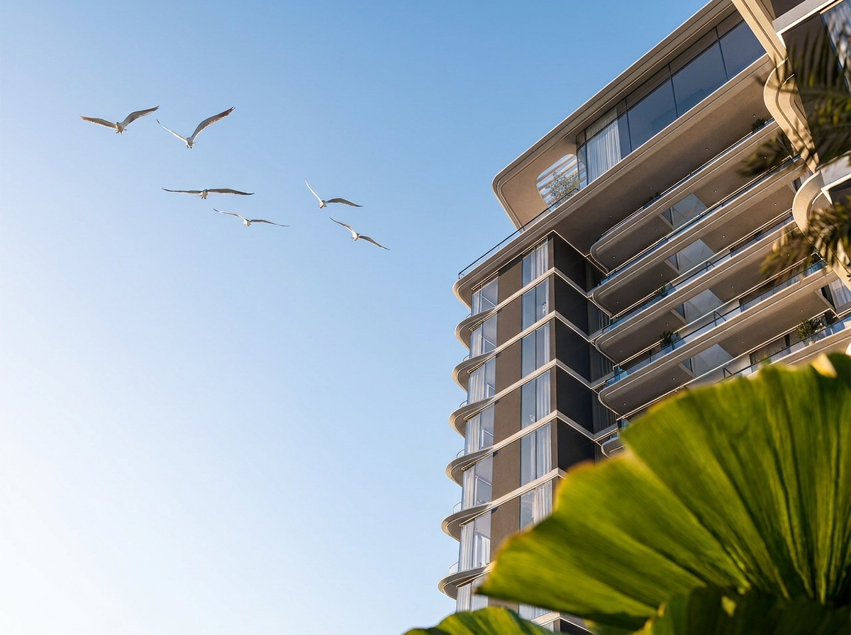 Vue extérieure de la tour résidentielle Omya Residences avec sa façade moderne et ses balcons