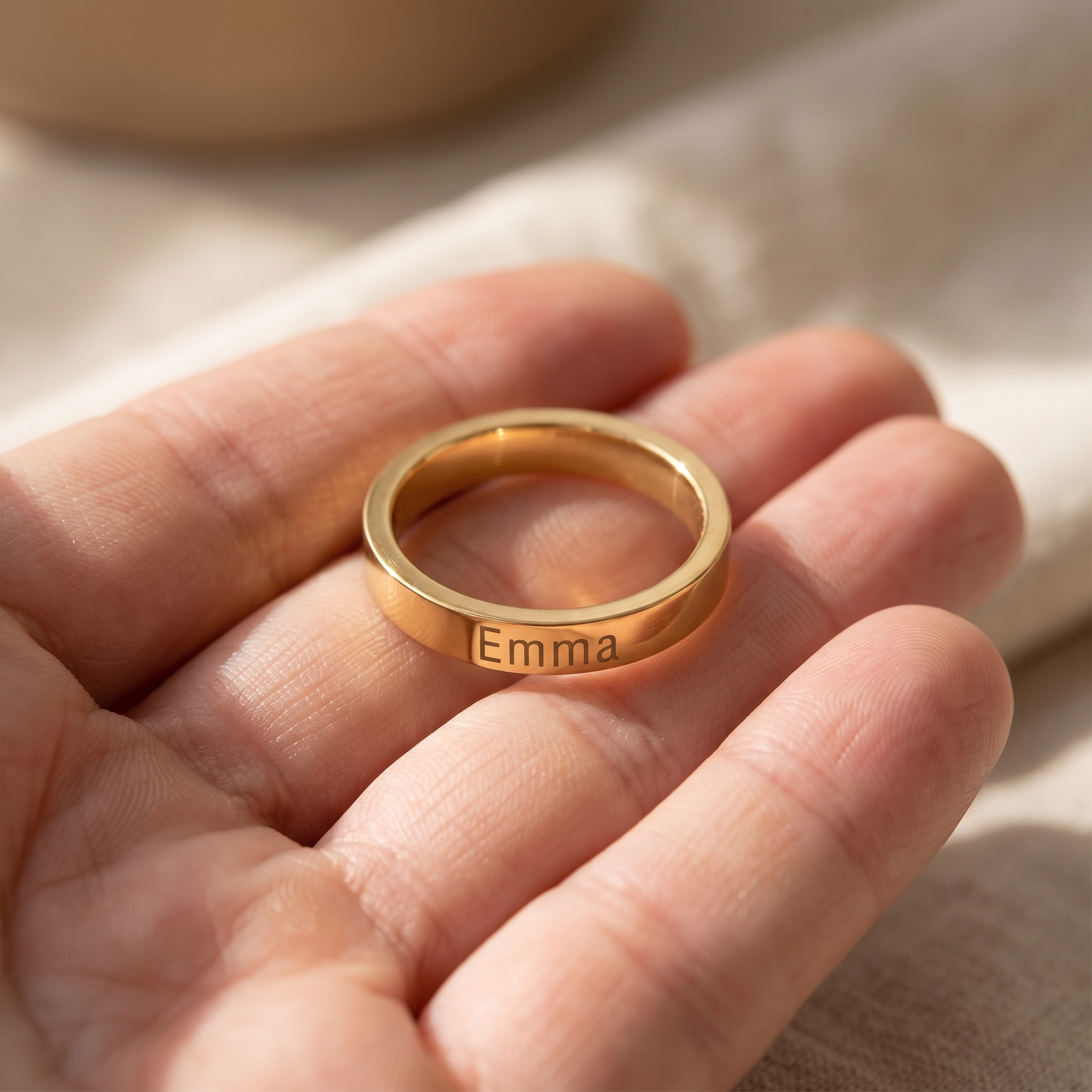 A slim band on a finger showing an unworn edge in close-up