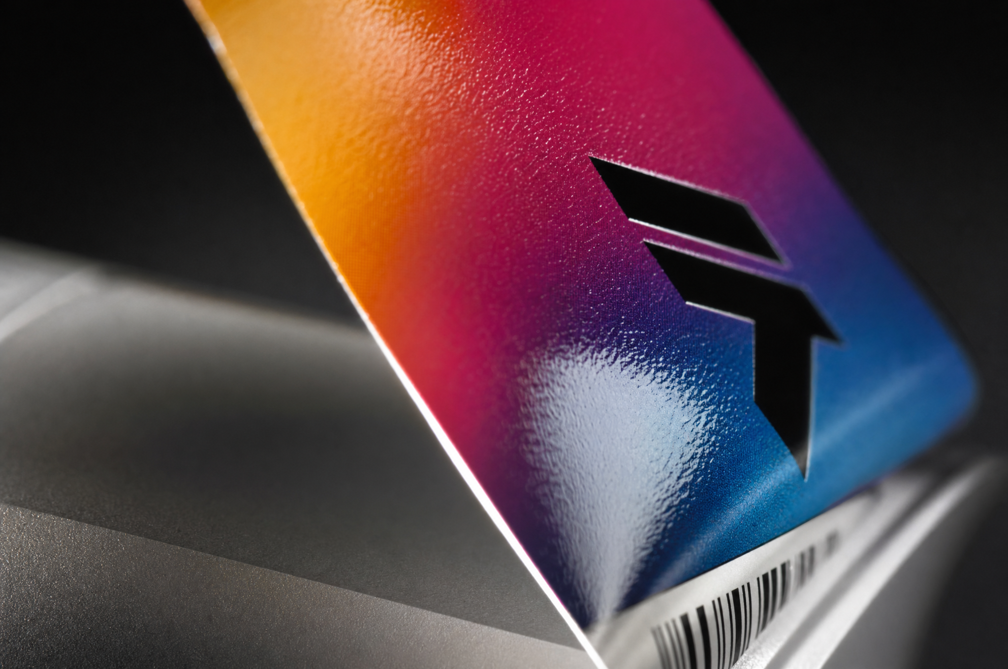 Extreme macro of a full-color label, ink meeting glossy substrate
