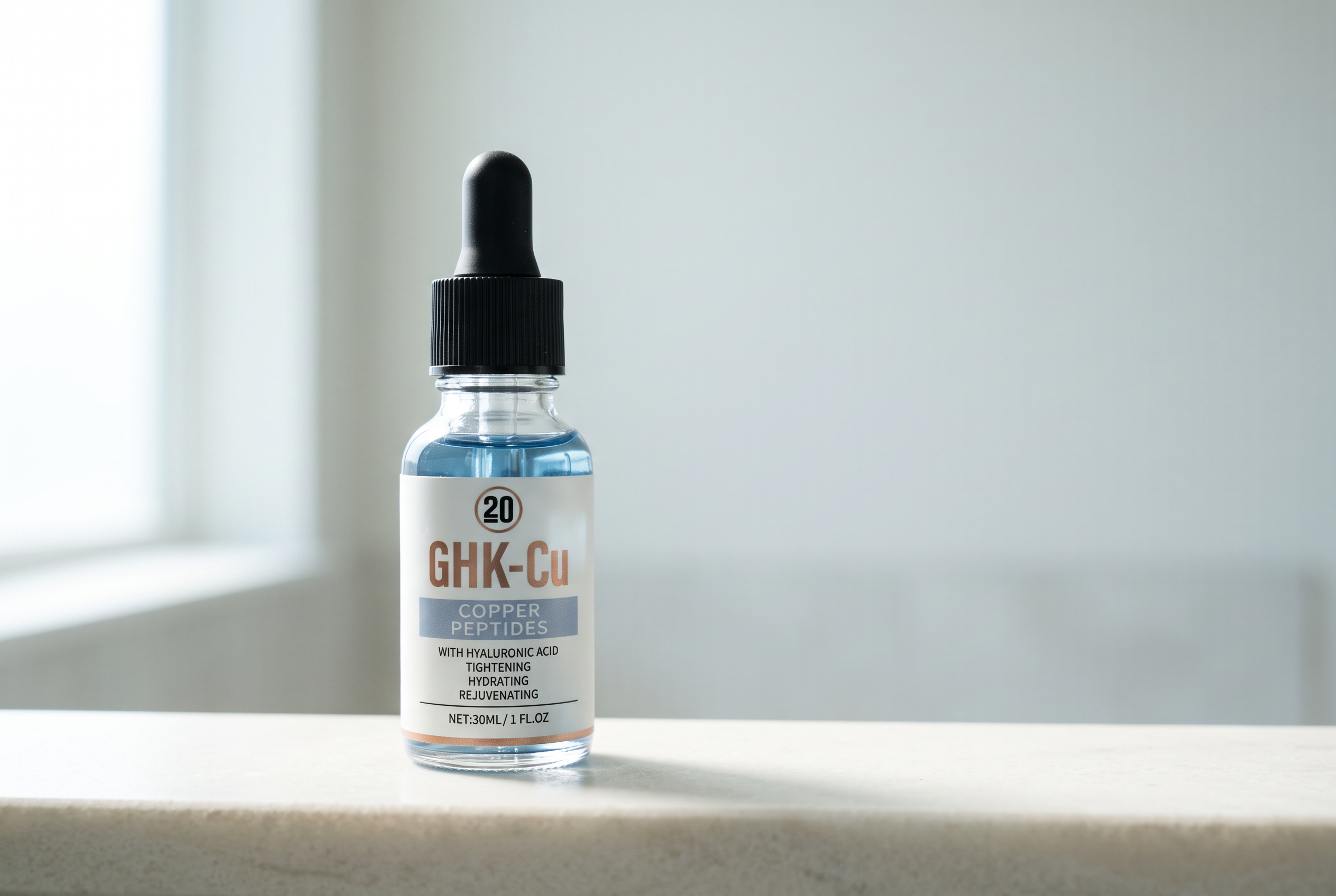 Division Twenty copper peptide serum bottle on a pale stone ledge