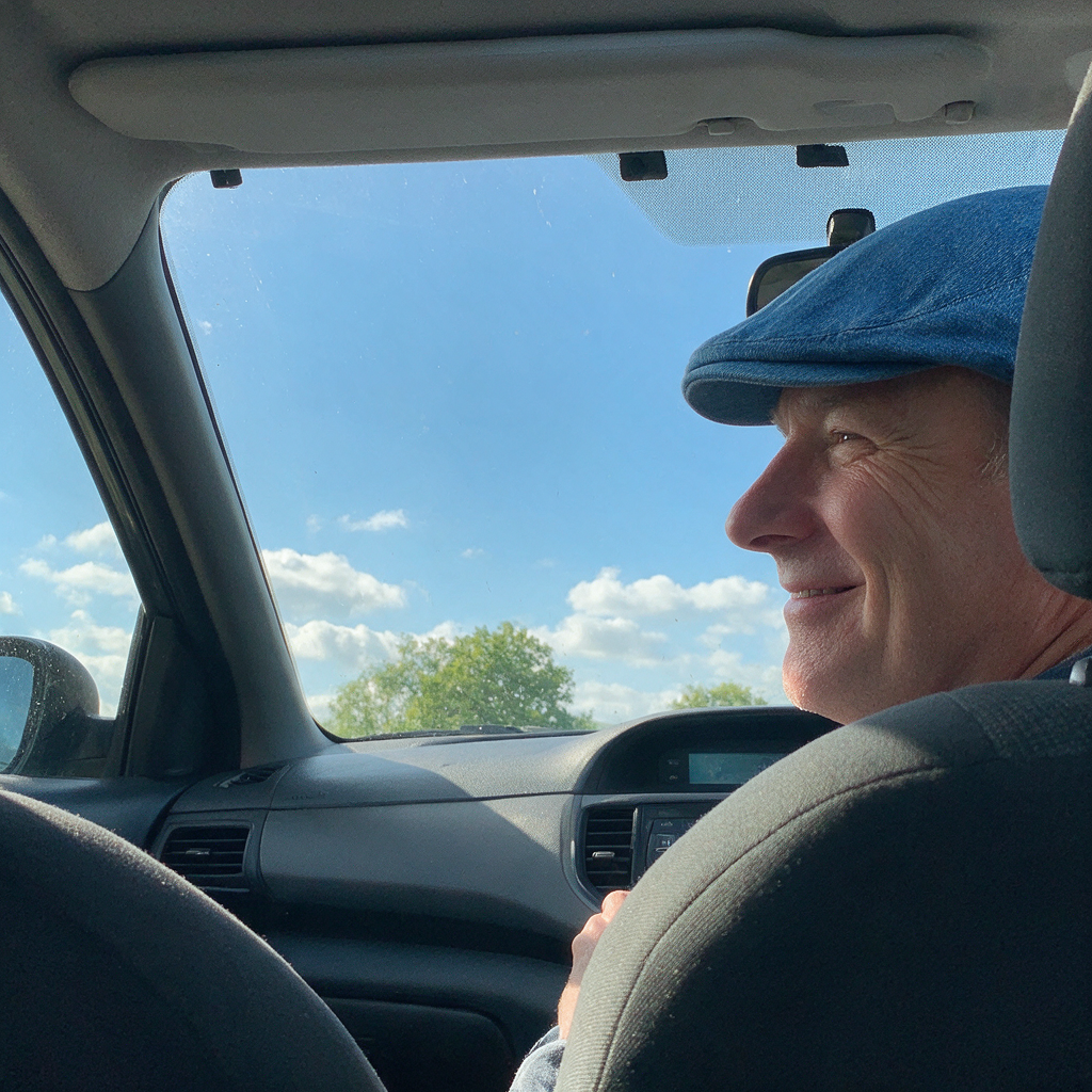 Wearing the Denim Vintage Cap in the car