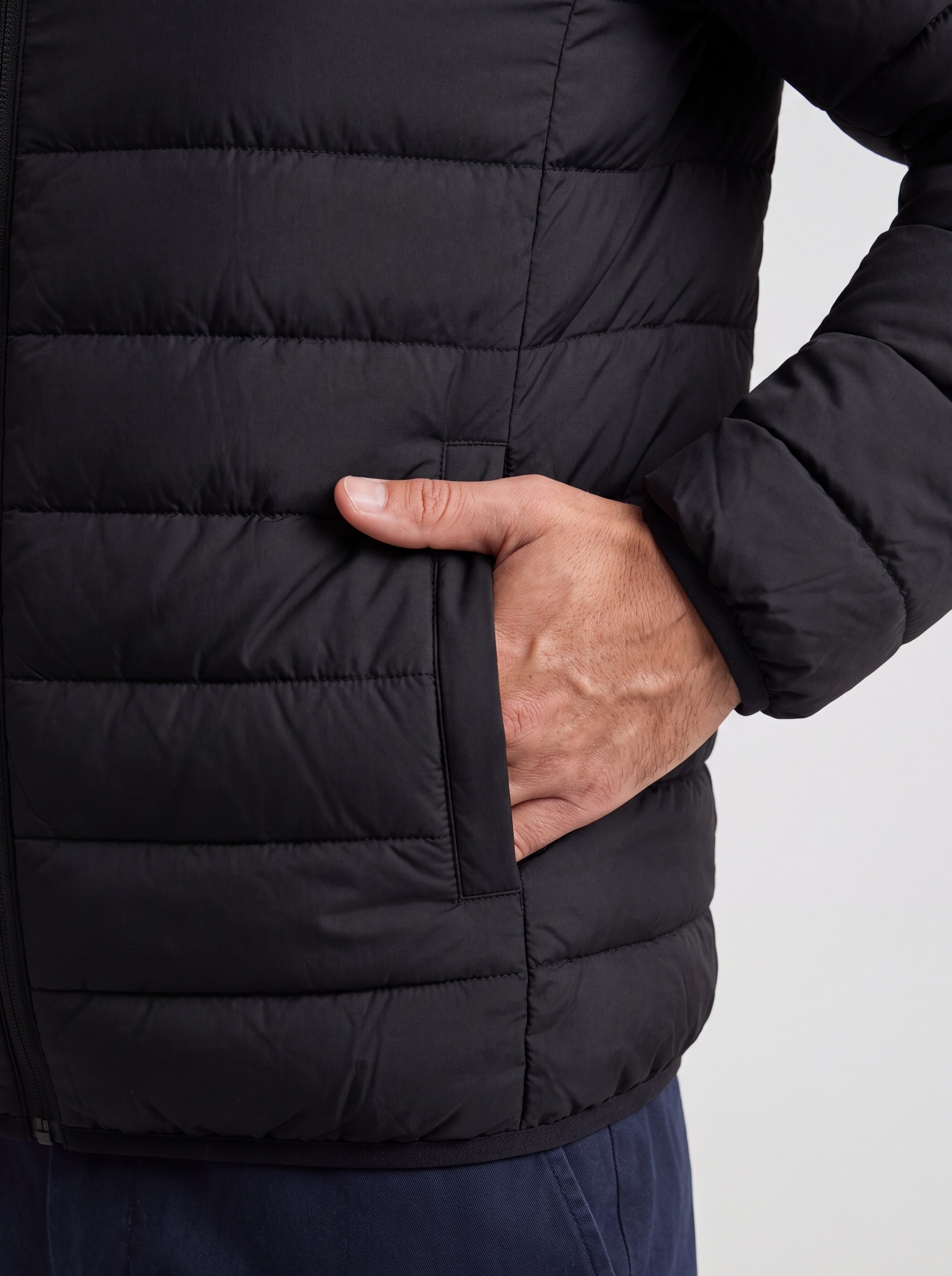 Hand in the welt pocket