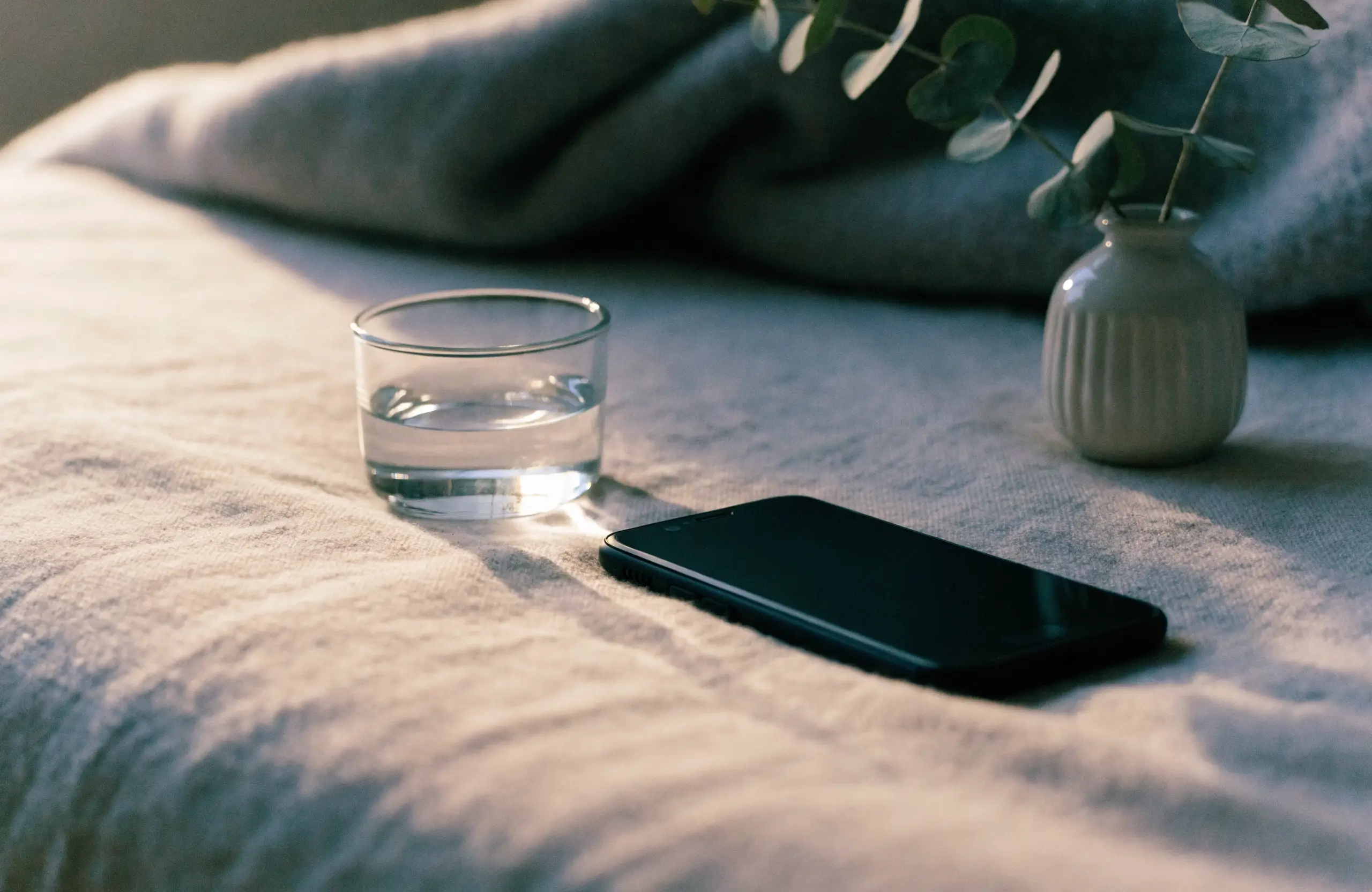 A calm bedside scene at dawn
