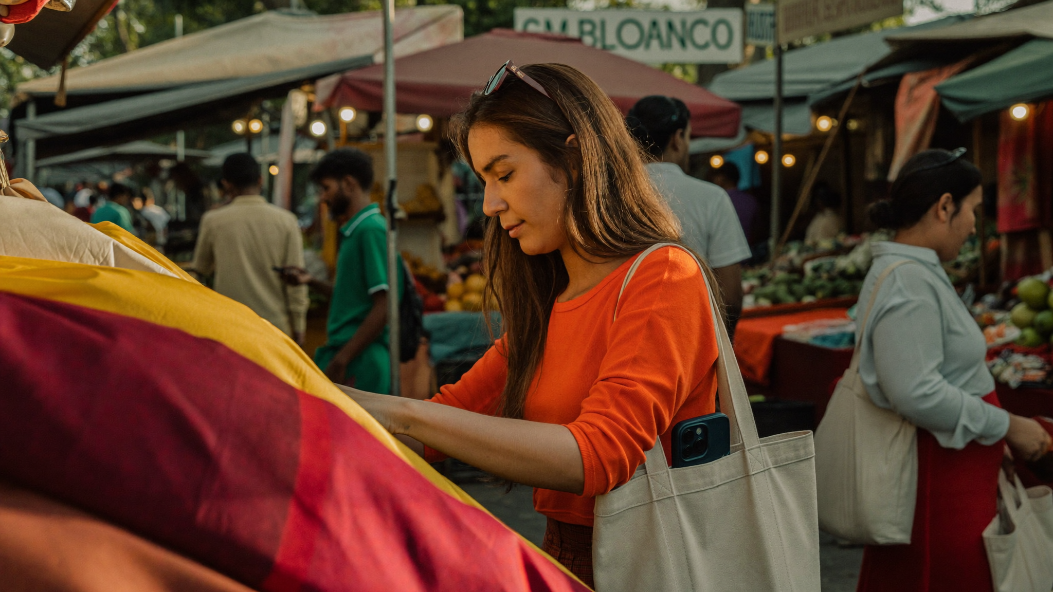 Traveller exploring a vibrant Colombo street market, colourful stalls in the background, smartphone tucked away