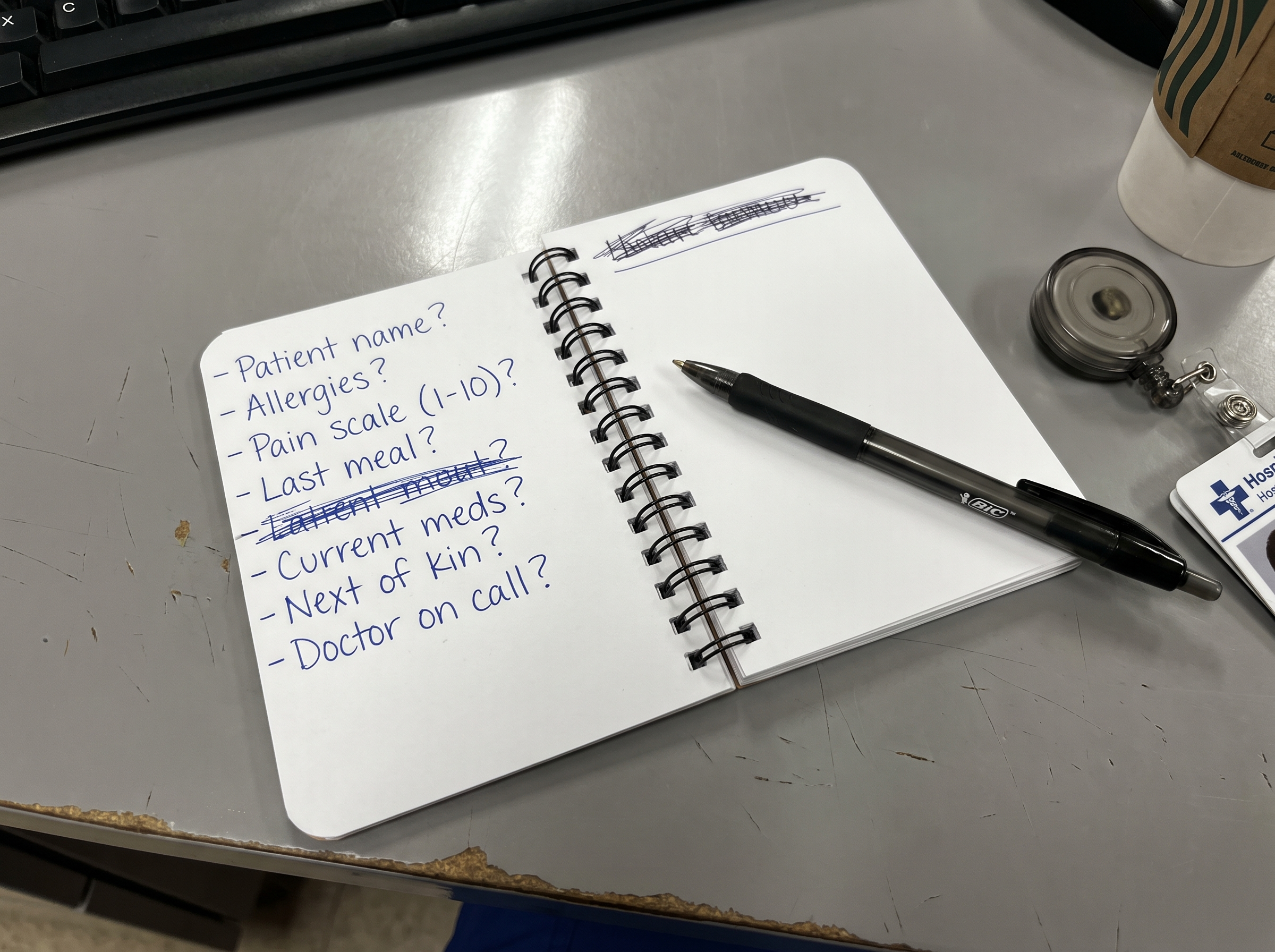 Pocket notepad of crossed out questions on a hospital counter